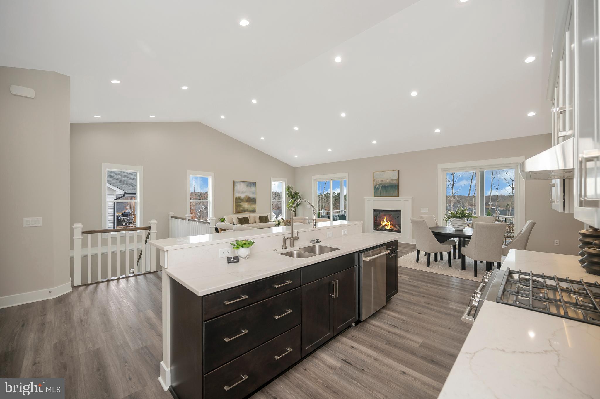 *OFFSITE MODEL* Experience the pinnacle of luxury lake living with this stunning 5,000 sq. ft. to-be-built home in the heart of Lake Anna (truly). Offering exclusive water access and a dedicated boat slip, this home is designed for those who crave both relaxation and adventure. The grand cathedral ceilings and expansive open floor plan create an airy, inviting atmosphere, perfect for entertaining and everyday living. High-end finishes, custom details, and luxurious living spaces ensure that every inch of this home exudes elegance and comfort. Thoughtfully designed for year-round efficiency and comfort, the home will feature a dual-fuel, dual-zoned heating system, allowing for precise temperature control across multiple levels. Buyers will also have the opportunity to personalize select finishes and design elements, allowing them to tailor the home to their unique style and preferences. Additionally, by securing their own construction loan, buyers can save both time and money while having more control over their financing options.
Beyond the home itself, the community offers an unparalleled array of resort-style amenities designed to elevate your lifestyle. Enjoy a professionally designed 45-hole disc golf course, a fitness center completed with TVs, and pickleball and basketball courts for endless recreation. The huge clubhouse serves as the heart of the community, featuring an entertainment center, beer tap, and gathering spaces perfect for social events. With 70 acres of maintained common area, you’ll have plenty of space to explore scenic walking trails and find your own private retreat. Whether you're spending your days on the water, enjoying the community’s incredible amenities, or simply unwinding in your beautifully designed home, this property offers the perfect balance of activity, luxury, and privacy. Don’t miss the chance to bring your dream home to life. Come by our off-site model to get a real feel of your future home! We have multiple lots available to really make your dream come true. Be sure to see the virtual tours and documents!