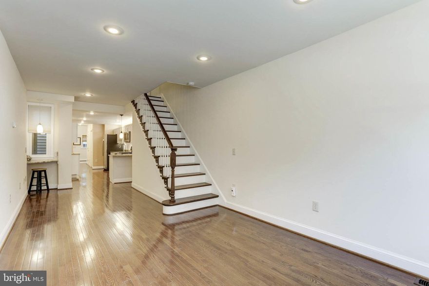 Beautiful home w/ 3 Bedrooms & 3 Full Baths (one on each level) w/in walking distance to Little Italy! Hardwood floors on main level w/ totally remodeled kitchen w/ SS appliance & family room/office in the rear. Two bedrooms on 2nd level & 3rd floor suite w/ access to roof top deck. Laundry room is on the main level as well.  Plenty of storage space in the basement. This home is move in & start living  your best city life ready! Schedule an appointment today!!!