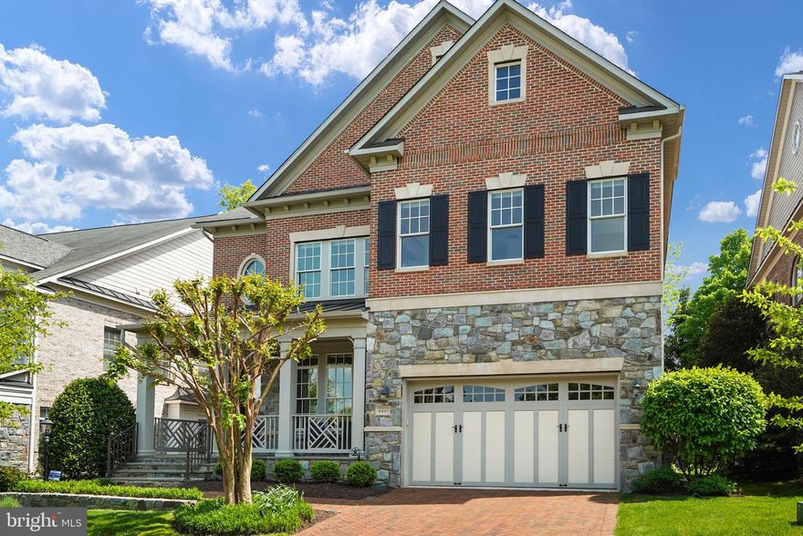 This stunning Craftsman style dwelling is over 5700 square feet and has been upgraded with the finest features and finishes. The property sits on a private, tree-lined cul-de-sac, providing a serene and peaceful retreat.

As you step inside from the covered front porch, you'll immediately notice the 11-foot ceilings, extensive crown molding, and recessed lighting, for an open and spacious feel. The front entrance hallway opens to the formal living room and a formal dining area with a bay window. The extra-large Pella windows throughout the home have luxury window treatments which let in natural light, and allows privacy. Each bedroom has black-out window treatments for night. 


The high-end Viking kitchen appliances make cooking a pleasure, with the newly installed white French country style countertops. The large eat-in kitchen opens to the family room that has the back wall lined with windows.  The family room multi-tray ceiling has extensive recessed lighting. The home office is a private space with French doors and built-in bookshelves. The ethernet high-speed internet and Bose audio speakers provide you with the latest in technology and the state-of-the-art security system.

Ascending the curved staircase will  take you into the secondary family living area/entertainment loft, with more built-ins, custom paneling with coffered walls. The owners' suite is a true oasis, featuring a separate sitting area, an extensive custom made closet, large bathroom with soaking tub, dual vanity, and oversized shower.  There are also 3 more spacious bedrooms with large closets and direct access to full bathrooms, and a generous laundry room with sink, built in cabinets and ample storage space. 

An unfinished lower level has endless potential for finishing to your tastes with high ceilings and  rough-ins for another full bathroom and wet bar.  The space already includes a large French double door walk-up stairwell to the rear of the home. 

Step outside to the beautifully hardscaped private back patio and exterior fireplace, perfect for entertaining and enjoying the outdoors with atmosphere uplighting. The customized and oversized garage offers storage cabinets and wall attachments; and a new upgraded overhead garage door opener with a camera. The home has been freshly painted, making it move-in ready.

The Stockwell Manor Community also includes extensive parkland with Haycock Park trails and easy walking access to Haycock Elementary and Longfellow Middle Schools and a short drive to Mclean High School.  Why worry about mowing your lawn when you can enjoy the massive common area, gazebo and playground just steps from your front door.  Additionally the home is located less than 1 mile from West Falls Church Metro and all the shops, dining and charm of Falls Church City.  Contact us today to schedule a viewing and experience luxury living at its finest!