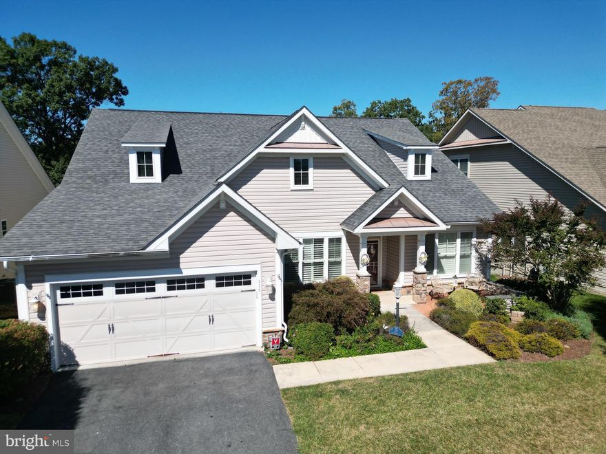 This 6,000+ finished sq ft home is LAKEFRONT & priced more than $40k UNDER TAX ASSESSMENT!Enjoy nearly 4,000 sq ft of spacious living on the main & upper levels plus a bonus 2,300+ finished in the lower level (with an additional 260 sq ft for a workshop/storage). Offering complete main level living (2,600 sf on the first floor)--including a formal dining room, living room, two-story great room, vaulted sitting room, cathedral sunroom (with doors to deck), gourmet kitchen (w/ island, butler’s pantry area, double wall ovens, built-in microwave & a 5-burner gas cooktop), tiled laundry room (w/ conveying front loading washer/dryer), owner’s suite (with tray ceiling, lake-front deck access, walk-in closet & luxury bathroom w/ corner soaking tub & tiled shower), guest bedroom (with private full bathroom & walk-in closet), foyer rotunda (with adjacent half bathroom), laundry room & two car garage. Upstairs, guests can enjoy an even larger bedroom with an even bigger walk-in closet, private full bathroom access & a 30x20 loft overlooking the great room (also with bathroom access). The lower level has a level walkout to the rear lake-facing yard & an open floorplan that includes an area that could easily be walled on one side to create a 4th bedroom w/ double windows. The bonus room/potential guest room was used by owners for crafting/model trains (shelving/tables can be removed if buyers wish) & could easily be a 5th sleeping area for guests. For those needing additional bedroom spaces, the open basement has enough windows to create two additional bedrooms & still offer plenty of recreation & storage space (this enormous home could easily have two walls erected to offer 6 bedrooms but is currently designed for a more open floorplan). Kitchen & baths feature granite counters, the main living areas are all hardwood floors & the guest bathrooms each feature lovely seaglass accents. UPDATES since owners had the home custom built include a new $9k HVAC (2023ish), $8k in landscaping (including a crape myrtle & now-gigantic evergreens), $13k in decking (20x15), $7k in a delightful front porch & $10k+ in custom plantation shutters. At the time of construction, builders were charging $250k+ in lot premiums for lakefront lots! Seller is willing to offer closing cost credit for painting, etc. to buyer’s tastes. (See video tour & documents section of MLS listing)
ABOUT THE RESORT COMMUNITY
 This award-winning 55+ gated neighborhood surrounds the 117-acre Lake Frederick (known as the best trophy largemouth lake in the Valley) & is situated on a 900 acre planned community at the foothills of the Blue Ridge Mountains (ideally located with easy access to I-66, I-81, Rt 50, Rt 7 & Rt 11). The athletic club features an expansive fitness center, movement studio, outdoor resort pool, indoor lap pool, infrared sauna & spa locker rooms. Outdoor enthusiasts can enjoy pickleball & tennis courts, dog parks (with off-leash areas), 8+ miles of lakeside trails for hiking, biking (& even horseback riding). The scenic lake offers fishing & non-gasoline boating.
Members & guests are invited to escape to the “Crow’s Nest”--an enormous social space that offers a golf simulation room, sports lounge, culinary studio, billiard room, poker & card tables, arcade games, private bar area, TVs, art/exploration studio, library, meeting venue, & lakeside covered gathering spaces. Enjoy curated social events, 50+ clubs & access to Trilogy’s many esteemed national programs.
The Shenandoah Lodge campus is also a sought-after venue which offers residents private spaces for social engagements. The facility includes a marketplace, award-winning restaurant & bar, “Region’s 117” (an upscale/casual farm-to-table venue open to the public) featuring a vast covered outdoor dining veranda w/ comfortable swings overlooking the lake/mountains, a private dining suite, grand firepit overlooking the lake, spectacular living room with inspiring center fireplace, & more.