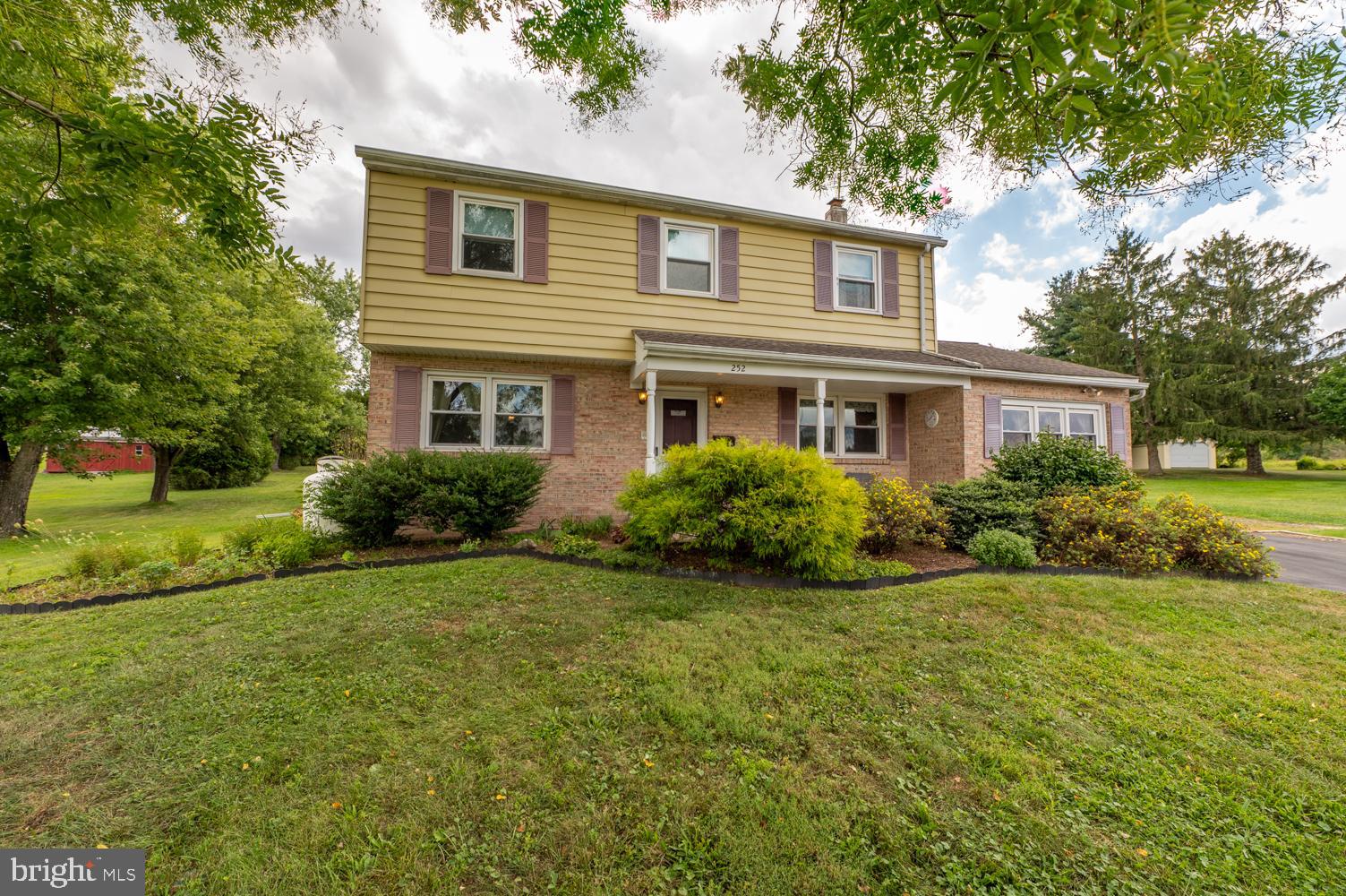 Located on a quiet street in Red Hill Borough, this two-story Colonial will not disappoint. The living room flows into a formal dining room with access to an expansive and bright sunroom that’s perfect for entertaining or relaxing. There’s plenty of cabinet space in the kitchen, which opens to flex space for an office, playroom, library, or whatever your vision brings. Sit back and unwind in the family room with an updated full bath and outside entrance. Upstairs, you'll find four bedrooms with generous closet space and a second full bath. An unfinished basement contains the laundry area and provides tons of additional storage. The spacious backyard and patio are an outdoor oasis with plenty of room for gardens, play, and privacy. At the end of the property is a large shed. The oversized one-car garage is divided and currently used as a workshop, but can be converted back. An additional parking pad allows space for 4+ cars in the driveway. Close to major routes, schools, restaurants, and within minutes of Green Lane Reservoir Park for year-round outdoor recreation, including boating, picnicking, fishing, and hiking. Schedule your showing today!