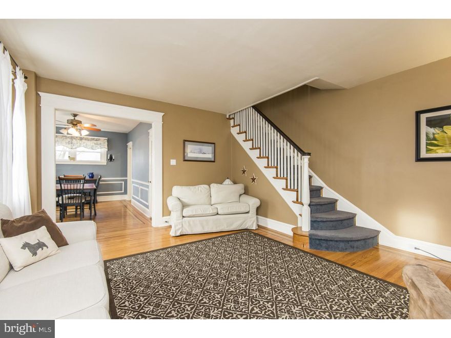 A beautifully maintained and updated home in Upper Darby Township! Enter this beautiful, move-in ready twin through the charming enclosed front porch, and be greeted by a spacious living room and formal dining room with chair rail, decorative trim and great hardwood flooring with dark inlay. Further you'll find a roomy modern kitchen with wood cabinets, dishwasher and gas stove, also attached is a breakfast/mudroom with outside exit to large rear yard and garage. Ascend to the second floor where you will find 3 great bedrooms as well as a full bathroom. The full unfinished basement includes laundry facilities, utilities, storage and an outside exit. Outside there is a detached garage plus a long private driveway for off street parking for 3  cars, not to mention the fenced in yard- perfect for your summer barbecues! This darling home also includes upgraded features such as a low maintenance exterior, thermal replacement windows, new 100 amp circuit breaker electrical service with new panel box (2/2015) and modern colors throughout. This home is close to shopping, township parks with ball fields and playground equipment, and public transportation leaving you within 30 minutes of Center City, PHL Airport, and King of Prussia, and includes easy access to major roads including Route 1, Route 3 and Route 476. Don't miss an opportunity to own this beautiful home!