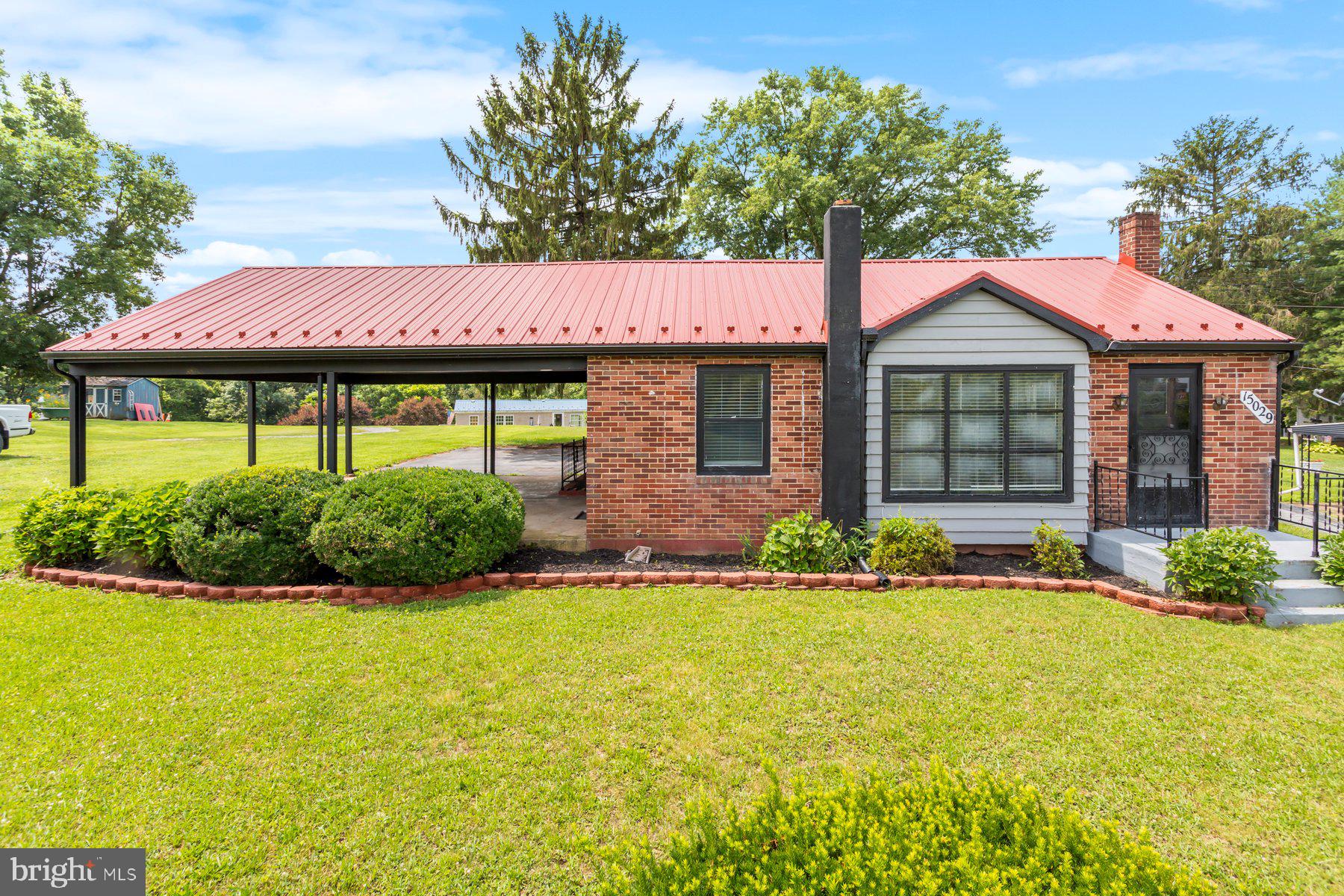 Fully renovated rancher featuring luxury vinyl plank flooring, modern stainless steel appliances, marble epoxy countertops, tiled tub shower and new vanity, HVAC with central A/C. With an attached carport. Situated on over a quarter acre, this home also offers a spacious walkout basement perfect for additional living space, storage, or entertaining.