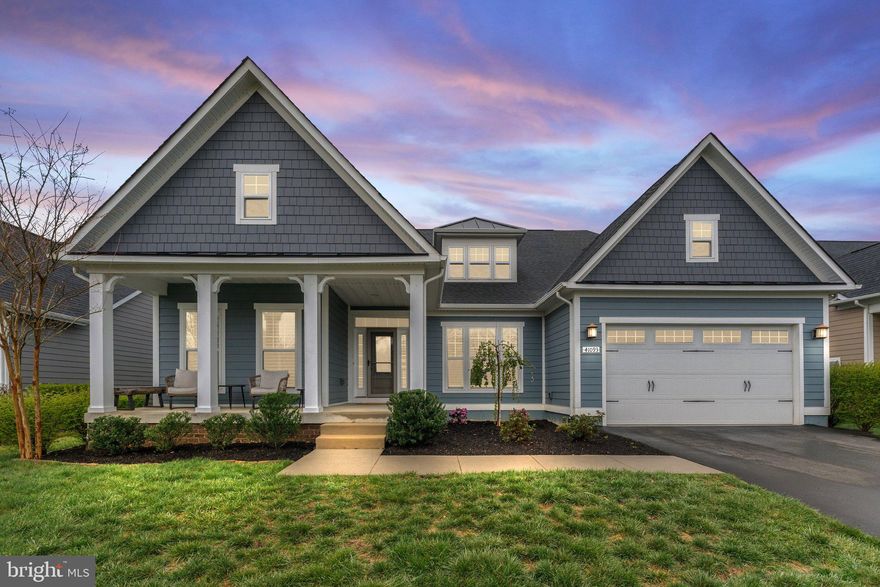 Nestled in the highly desired Greens Village section of Willowsford, this stunning raised rambler brings main level living to a whole new meaning. This immaculate home offers an open floor plan, pristine outdoor stone patio that backs to conservancy. Located in the Lightridge HS Cluster which includes Willard Middle School, and two great elementary schools in Hovatter and Henrietta Lacks. Receive the benefits of the Willowsford community amenities such as the two-resort style luxury community pools, miles and miles of hiking and biking trails, a fun splash-pad for the little ones, numerous outdoor pavilions with fire pits, camps grounds, an archery range, a treehouse playground, a zip-line playground, an abundance of ponds to go fishing in, holiday/ seasonal community events, and much more! 

As you enter this gorgeous home you will see immaculate wide plank hardwood floors throughout the main level. A spacious private office will be to your right and a lovely dining room with an updated light fixture to your left. Make your way to the gourmet kitchen area that features an enormous island, granite counter tops, plenty of cabinet and counter space, stainless steel appliances, modern subway tile backsplash, updated pendant lighting fixtures, and a large pantry. Spend quiet nights together with family and friends in the family room by the cozy gas fireplace with stone veneer accent wall or spend summer nights in the amazing backyard outdoor space. 

The meticulous outdoor area will be one of your favorite places to entertain which includes a flag stone patio, covered porch with trek wood, and privacy as the backyard backs to conservancy area. 

Experience the convenience of the rambler style living where the majority of the bedrooms are on the main level. The expanded primary suite features a huge walk-in closet, tray accent ceiling, brand new carpet, and a spa-like bathroom with dual vanities, an expanded shower with bench, and a private wash closet. Bedrooms 2 and 3 also have brand new carpets. The main level also offers a laundry/mud-room combo for easy access to organizing kids stuff and washing clothes. Make your way to the huge, finished walk-up basement that has plenty of space for entertaining guests.  The basement features wide plank luxury flooring, an extra guest bedroom, full bath, and large storage space.  There is even enough space in the storage area to create a home theatre or fitness center as well. 

Don't miss this incredible opportunity as showings are already starting to fill up!