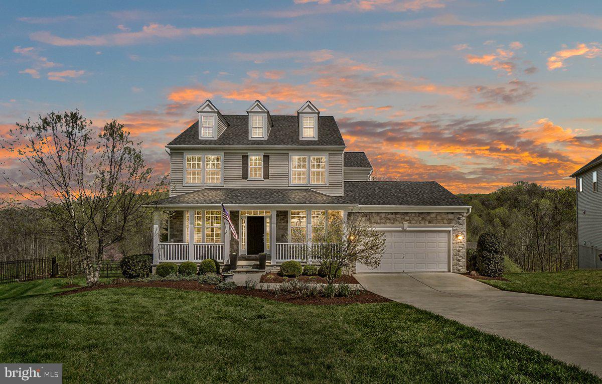 Welcome to The Daphne – An Exquisite Gem in Clearview at New Market
This stunning 4-bedroom, 2.5-bath home is lovingly maintained by the original owners and shows better than a model. Nestled at the end of a peaceful cul-de-sac, the stone-front elevation offers fantastic curb appeal while providing a private backyard retreat—perfect for entertaining or unwinding in peace.
Step inside and you'll immediately notice the designer-inspired finishes throughout. From upgraded lighting in the kitchen and primary bedroom to gorgeous granite countertops, stainless steel appliances, and rich maple cabinetry in both the kitchen and butler's pantry—no detail overlooked. The large kitchen island provides ample workspace and a natural gathering spot for friends and family.
The main level features beautiful hardwood flooring that flows seamlessly through the open-concept layout, creating a warm and welcoming atmosphere. The hardwood extends to much of the upstairs as well. Fresh, modern paint colors complement the space with style.
Step out into the huge owner-added screened-in porch with natural wood ceiling —an ideal spot for morning coffee or a quiet afternoon read. The backyard is a showstopper, with resort-style dual-level patios offering both sun-drenched and shaded options. A built-in grill, connected to the buried propane tank, means you’ll never need to worry about swapping tanks mid-barbecue again!
Upstairs bathrooms feature large-format tile, adding a sleek and durable touch. The spacious primary suite and additional bedrooms include custom built-out closets, maximizing organization and style.
The walk-out basement is massive, with two separate entrances and a rough-in for an additional bathroom, giving you endless potential for customization—think guest suite, gym, or entertainment space.
And don't forget the rare 3-car tandem garage—perfect for vehicles, hobbies, storage, or even a workshop. The meticulously maintained landscaping completes this dream home package.
Located in the sought-after community of Clearview at New Market, near some of the best schools around, this home blends upscale features, thoughtful design, fantastic location and unbeatable outdoor living.