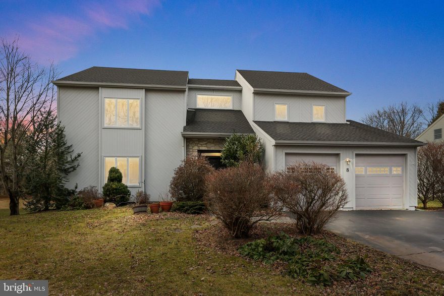 Discover elegant living in this beautiful home situated in Newtown's secluded Walnut Ridge community, surrounded by the natural beauty of Tyler State Park. As you enter, you're greeted by a grand 2-story foyer that sets the stage for the charm within. Newer wood floors everywhere you look - The open staircase leads to a bright second-floor hallway with a picture window that fills the space with natural light. 9 foot ceilings on the 1st and 2nd floor. Entertain effortlessly in the spacious family room, complete with a cozy gas fireplace, wet bar, and custom recessed lighting. The kitchen is a chef's delight with 42" custom cabinetry, granite countertops, stainless steel appliances, and wood flooring. Step out onto the large, fully screen-enclosed deck from the dining area, perfect for enjoying meals while taking in the private back yard. The master bedroom suite is a retreat, featuring a gas fireplace, recessed lighting, and customized Elfa closet systems as well.  The master bath is designed with a stall shower, pedestal tub, and two separate vanities. Three additional generously sized bedrooms and a large hall bath provide plenty of space for family and guests. The finished basement offers endless possibilities for recreation and relaxation along with a guest area and a full bathroom.  Outside, the fenced rear yard, lower open deck, and paver patio.  A Whole-house generator is included so you never have to fear losing power. Gutter guards on the home so you never need to clean the gutters. Newer HVAC installed (Nov 2021) for peace of mind. Don't miss out on this exceptional home in one of Newtown's most desirable neighborhoods and the proximity to Newtown Borough shopping and restaurants is most desirable. You can walk to Tyler State Park, Newtown Middle School and Council Rock North High.