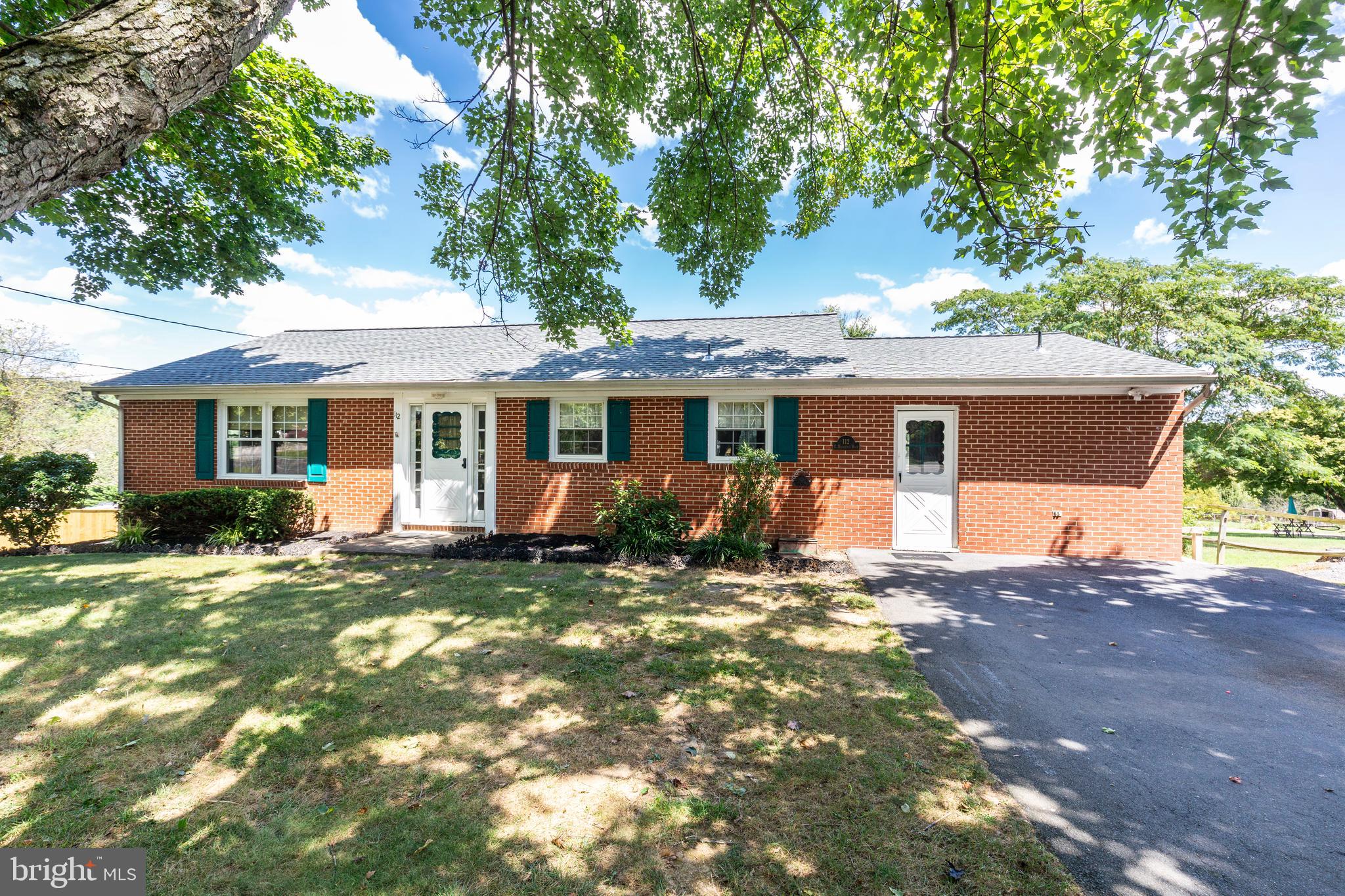 Welcome home to this charming all-brick rancher offering the perfect blend of comfort, space, and privacy! Featuring 3 generously sized bedrooms and 3 full bathrooms, this cozy home boasts a spacious country kitchen ideal for gatherings, a formal dining room, and hardwood floors throughout the main level. The partially finished walk-out basement adds valuable living space, featuring a family room, office, laundry room and storage/utility room. Enjoy outdoor living on the low-maintenance composite deck overlooking a fully fenced yard surrounded by mature trees, paver walkway and water feature. A shed with electric provides extra storage and convenience for tools or hobbies. Additional highlights include a new roof (2024), radon system, new gutters and leaf system, replacement windows, water neutralizer, and more!