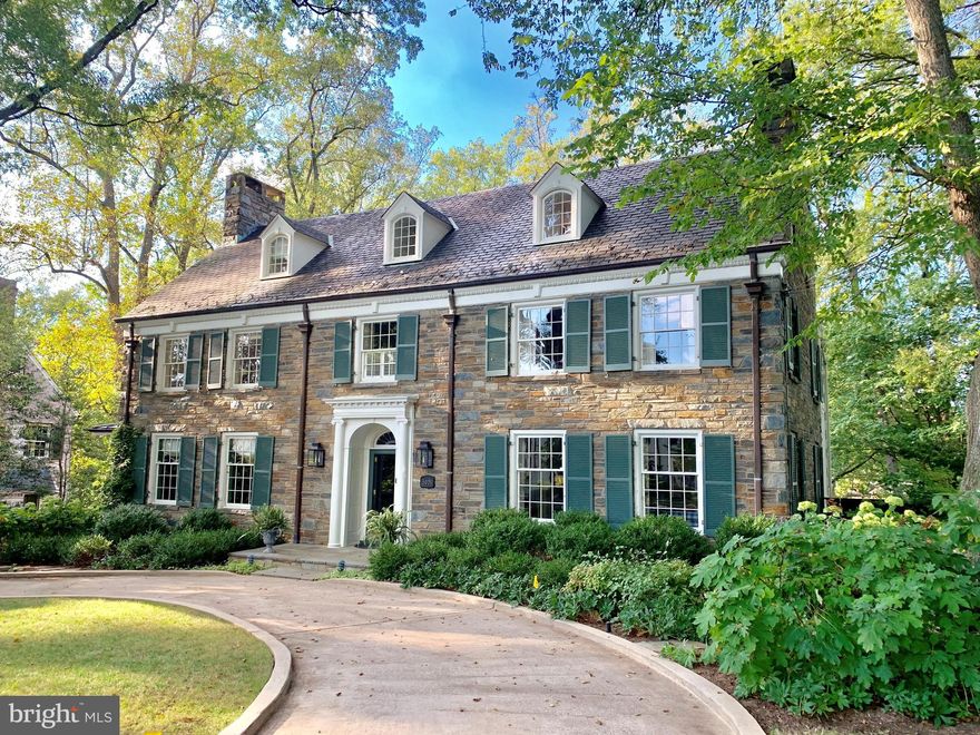 Ideally sited on perhaps the most desirable street in Washington, this handsome stone Georgian home w/ circular drive is sited on a half of an acre w/ level yard, pool, & generous room sizes w/ circular flow, & affords one gracious entertaining & comfortable family living.  Six fireplaces, walls of windows, professionally designed landscaping & high ceilings all add to the spectacular entertaining & very comfortable living aspects of this singular home. This extraordinary home is located on a treelined street w/ cul de sac & sidewalks in a neighborhood w/ strong community spirit & convenient to many schools and restaurants.