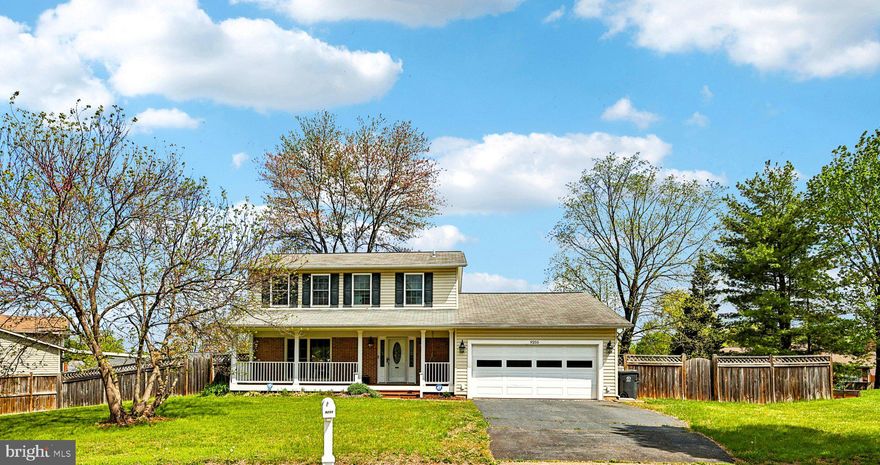 Discover refined living in this beautifully updated Colonial, perfectly positioned on a quiet Manassas cul-de-sac. The main floor features an open concept layout with hardwood floors throughout, centered around a chef’s kitchen with custom cabinetry, granite counters, and a social breakfast bar. Upstairs, the primary retreat offers a private ensuite and walk in closet, while the updated secondary bath impresses with luxury heated floors, separate tile enclosed shower,  and a jetted soaking tub. Relaxation extends outdoors to a covered front porch and an expansive rear deck overlooking a custom flagstone patio and a fully fenced yard. With a two car garage and prime proximity to Old Town Manassas and the VRE, this home offers an ideal blend of suburban peace and urban convenience.