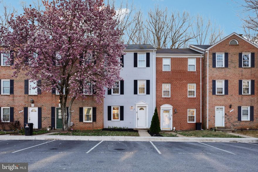 Welcome to this beautifully updated three-level townhouse in Georgetown Park! Freshly renovated with paint and new luxury vinyl plank (LVP) flooring and carpet throughout, this home exudes a clean and modern feel. Entering through the main level, you'll find your massive laundry room (with new water heater), full bath and home office space. The first upper level functions as your main with sleek, well-equipped kitchen - complete with quartz counters, new stainless steel appliances and deep single bowl sink. There's also a wonderfully open living and dining room space with french door access to the fully fenced rear yard, ideal for entertaining friends for a summer BBQ!  Three spacious bedrooms on the upper level, including a well-appointed full bathroom, this home is ready for you!  With low HOA fees, two assigned parking spots, and a prime location, this property offers both value and convenience.