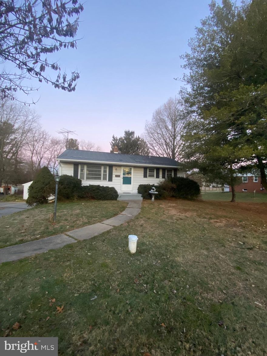 Charming rancher on over a half acre of land! Country setting with the convenience of being close to town! Two bedrooms upstairs with a full kitchen, living room and dining room. The lower level features a bar area with a den or could be used as a bedroom along with a full bath. Also includes a small den on the other side with a walkout sliding door to the rear yard. Full laundry and water treatment system (owner has serviced every 2 years). You don't want to miss this one! Must use listing agents application and lease. First month's rent and security deposit due upon lease signing. Small dogs only will be considered.