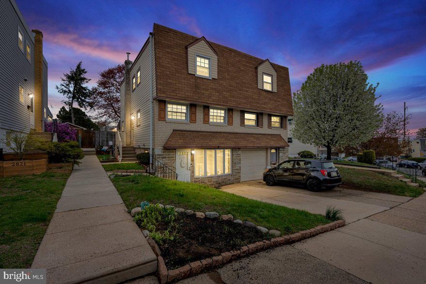 Welcome to this extremely well maintained 3 bedroom, 1.5 bath, twin style home with an expanded, fully finished lower level that's situated on a quiet street in the highly desirable Pennypack/Holme Circle Section of N.E. Philadelphia. Approaching you will instantly admire the amazing curb appeal with tasteful landscaping, lovely stone and brick front exterior, oversized bow window,  and a private front driveway. Enter into spacious and bright living room which showcases recessed lighting,  custom wood shelving that enhances  the glass sliding door that leads to the tranquil,  enclosed patio that overlooks the private, completely fenced-in yard. The first floor also features a formal dining room with ceiling fan light fixture, chair rail moulding that finishes off the paneling, and a open concept that carries into the eat-in large kitchen. This timeless kitchen exhibits plenty of wood cabinetry, built in appliances, ceiling fan light fixture, stainless steel sink, an abundance of countertop space, and luxury wood style flooring. The second floor host 3 generous size bedrooms all including ceiling fan light fixtures,  and ample closet space as well as a recently renovated 3-piece hallway bathroom with ceramic tile surround. The expanded and beautifully finished lower level provides additional living space which is suited perfectly as a family room/ rec room/ possible 4th bedroom.  This magnificent floor has been modified and spans the entire length of the house. The additional living space is highlighted with a faux brick fireplace, plush w/w carpeting, storage closets, laundry closet with all the amenities, half bath, and a large bay window that allows an array of natural light into the lower level.  Some additional features include being in close proximity to the scenic Pennypack Park, public transportation, top rated schools, and all major highways. From top to bottom this home has been well cared for throughout the years and it clearly shows...