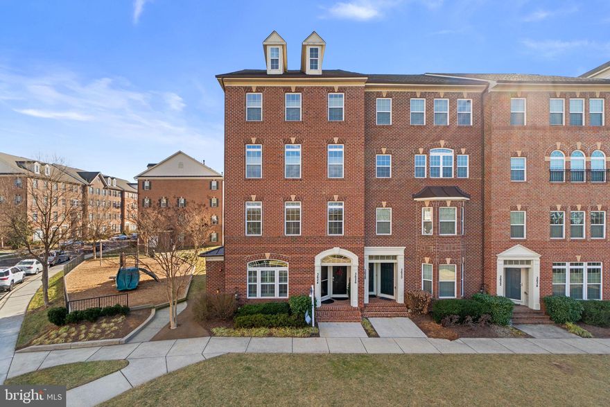 Welcome to this beautiful end-unit townhouse-style condo in the highly desirable Villages of Urbana. Positioned to face a tranquil wooded backdrop and located just steps from a nearby playground, this home offers a rare combination of privacy, scenery, and community convenience. Inside, the thoughtfully designed two-level floor plan features high ceilings and natural light throughout. The main level showcases an open living and dining space ideal for both everyday living and entertaining, flowing seamlessly into a well-appointed kitchen with granite countertops, ample cabinetry, stainless steel appliances, and an island with room for seating. True to the property’s open concept layout, the family room with oversized triple window and arched transom is just off the kitchen, making the main level living ideal and accessible. Quality finishes such as plantation shutters, hardwood flooring, crown molding, recessed lighting, and updated appliances add warmth and polish. A powder room rounds out the main level. Upstairs, the generous primary suite provides a comfortable retreat with dual walk-in closets and a private en-suite bath with a large walk-in shower and double sink vanity. Two additional bedrooms, one which steps out onto an easy maintenance composite balcony, offer excellent closet space and flexibility for guests, a home office, or additional living needs. A full hall bath and a conveniently located laundry area complete the upper level. Additional highlights include a newer HVAC system, fresh paint, new carpet, an attached one-car garage with driveway parking, well-maintained interiors, and a layout that maximizes both function and flow. Located within the Villages of Urbana—home to Blue Ribbon-awarded schools—residents enjoy access to exceptional amenities, including three resort-style pools, two fitness centers, sports courts, walking and biking trails, playgrounds, and community clubhouses. Just minutes from commuter highways, shopping, dining, and the charm of downtown Frederick, this home offers low-maintenance living in one of Frederick County’s most sought-after communities. A rare end-unit opportunity with wooded views, nearby play space, and an unbeatable location—this one truly checks all the boxes.