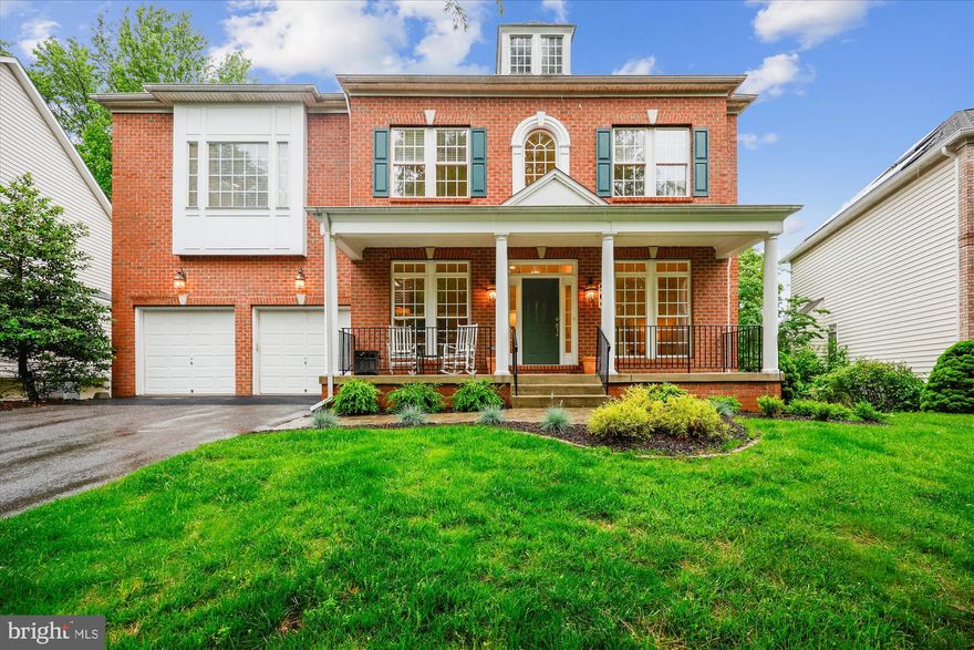 Exceptional John Laing Homes Mary Sheerer model on a private lot in Rose Hill. This 5BR/4.5BA colonial features approximately 5,000 square feet of living area on three fully finished levels plus a two-car garage and an old-fashioned covered front porch. Special features include a great sense of light and spaciousness with 10-ft. ceilings on the main level and 9-ft. ceilings on the upper and lower levels; model home décor with custom painting and elaborate molding; two gas fireplaces; hardwood flooring on the entire main level and new stamped-patterned carpeting on the upper and lower levels; upgraded maple, granite and stainless kitchen with center island; remodeled bathrooms throughout with designer ceramic tile and LVT flooring, new granite vanities, and new bath fixtures; recessed lighting, upgraded lighting fixtures, new door hardware, and 2-inch blinds throughout; professionally manicured lot, cobblestone paver walkway to full front porch, entertaining rear yard with deck and private lower-level hot-tub hideaway.  Dramatic two-story foyer entrance with transom and sidelite windows, curved solid oak staircase, wrought iron chandelier, and upper-level overlook; formal living room with crown molding off of foyer; double French door entry to office; dining room with crown, chair rail, and shadow box molding; powder room in hallway; gourmet kitchen with 42-inch maple shaker cabinets, GE stainless appliances, granite countertops, recessed lighting, center island/breakfast bar, desk/workstation area, and walk-in pantry; breakfast room with bow window and French door to rear deck with vinyl railings; family room off kitchen with marble gas fireplace, ceiling fan, and walls of windows with transoms above; curved staircase to upper level landing with recessed lighting, chandelier, linen closet, and laundry closet with LG h/e washer & dryer; primary bedroom suite with sitting room separated by three-way gas fireplace, bay window, two ceiling fans, and two walk-in closets; remodeled primary bath with ceramic tile flooring, dual vanities and makeup counter with granite countertops, undermount sinks, new plumbing fixtures, new lighting fixtures, Jacuzzi soaking tub on ceramic tile tub deck, ceramic tiled walk-in shower with glass block wall and dual showerheads; second and third bedroom with walk-in closets and shared buddy bath; fourth bedroom en- suite with private bathroom; walk-out lower level with recessed lighting and full daylight windows throughout featuring a recreation room with double French doors to rear yard and private hot tub retreat (2025); den/fitness room; fifth bedroom with two floor-to-ceiling windows and full bath; architectural shingle roof (2018), dual-zone gas HVAC (2018), and 75-gallon gas hot water heater (2020).  Rose Hill has deftly blended the appeal of historic Rockville’s past with the allure of its future. Be part of the vibrant Rockville Town Center featuring shopping, fine restaurants, sidewalk cafes, the Rockville Regional Library, Regal Cinemas, and other entertainment and cultural facilities.