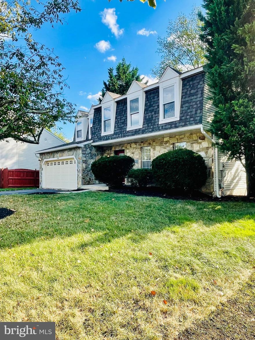 This charming colonial home is set on a generous 9,627-square-foot lot with convenient access to Routes 70 and 40. The main level presents a welcoming atmosphere with neutral-toned walls and a remodeled fireplace. The dining room and well-appointed kitchen feature elegant hardwood flooring and are bathed in natural light, enhanced by a full-size window and doors leading to the deck. The kitchen countertop was remodeled in 2025. The upper level comprises four spacious bedrooms. The primary suite includes an attached bathroom with dual vanities and a walk-in closet. New carpeting was installed on the second floor in 2025. The lower level offers a laundry room and a versatile space with an attached full bath, making it ideal for a den or a potential fifth bedroom. The exterior features a fully fenced yard and a large deck, complementing this inviting residence. Propane tanks are not included with the property.
For buyer peace of mind, a new roof was installed in 2023. The seller is also offering a home warranty with a value of up to $600.
