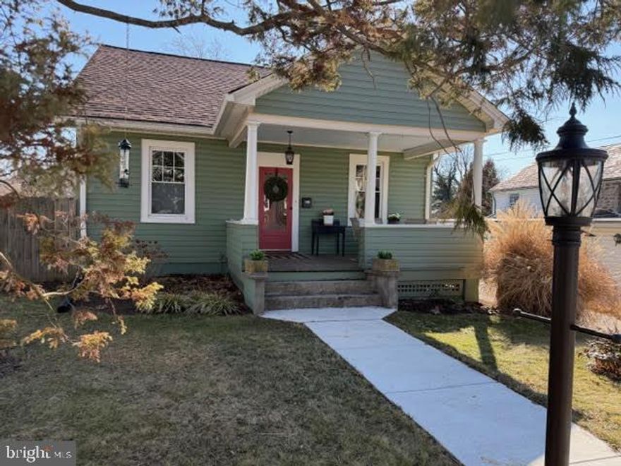 A quintessential Front Porch, Timeless Details and Updates on an Exceptional Lot, all within a Desirable Pocket of West Towson- Welcome to 507 Allegheny Avenue. Spacious interior, inviting lines, natural light, very good closets space, built-ins and handcrafted character—paired with major improvements make everyday living easy. A newer roof and purchased solar panels provide long‑term efficiency, while replaced windows enhance comfort and quiet throughout the seasons.
Inside, the heart of the home is an updated, open kitchen with a generous island and custom cabinets, pantry and desk area, double stainless sink, all perfect for cooking, gathering, and connecting. The layout is exceptionally livable, offering a first‑floor primary suite and main‑level laundry, creating true one‑level living without sacrificing space or style. 🔥 A welcoming living room with a gas fireplace anchors the main level with warmth and ambiance. A dedicated dining room offers the ideal setting for everyday meals or special gatherings, Easy flow between rooms gives the home a bright, grounded feel. Other Notable Improvements include a newer hardwood flooring, newer hot water heater, upgraded electric panel, newly installed radon remediation system (Target Radon), newly installed rear concrete drive, newly installed electric to the garage, newer front walk and steps, newer central AC compressor, replaced sewer and water lines and an updated upper bath. 🌞 The Outdoor Space truly feels Like an extension of the home. The yard is a standout—spacious, sunny, and beautifully usable, with rear fencing and raised garden beds that create a peaceful, protected outdoor retreat. Whether gardening, entertaining, or simply relaxing, the space feels both open and intimate. 📍 This is Truly an Exceptional Towson Location-Set in one of Towson’s most convenient and desirable spots, this home places you moments from: The YMCA and walking trails, The West Towson Park and Towson's cafes, restaurants and shopping,