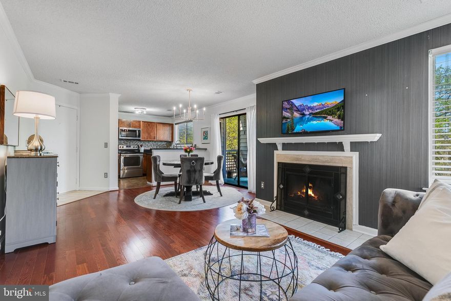 ***Photos coming 4/24.*** Welcome to 11743 Summerchase Circle, #D, a beautifully updated condo situated in North Reston’s popular Summerridge community. This mid-level unit features two spacious bedrooms, two full bathrooms, and an open, light-filled floor plan with fresh paint and new updates throughout. The kitchen offers stainless steel appliances, granite countertops, and flows seamlessly into the dining and living areas, all accented by durable LVP flooring and a cozy wood-burning fireplace.

Step outside to a private patio, perfectly framed by a leafy tree that offers shade and a sense of seclusion—ideal for quiet mornings or relaxing evenings. Thoughtfully designed with plenty of closet space and additional storage, this home also includes one assigned parking space and ample guest parking.

Summerridge offers residents walking trails, playgrounds, and access to nearby parks, pools, and sports courts. Just around the corner, North Point Shopping Center provides everything from grocery stores and coffee shops to casual dining and specialty boutiques.
This move-in-ready home offers the perfect combination of comfort, convenience, and community living in the heart of Reston.

*** $848/annual fee to Reston Association now includes access to all recreation facilities at no extra cost (15 pools, 52 tennis and pickle ball courts, trails, tot lots and field maintenance, plus 55 miles of pathways). Development is investor-friendly; FHA-approved. Property is vacant/no sign on property, seller would prefer to settle ASAP.  HVAC 2012, HWH 2014, roof 2010 (Association's responsibility). NOTE: This is a walk up (one flight of stairs), no elevator. **2 T.V's convey.