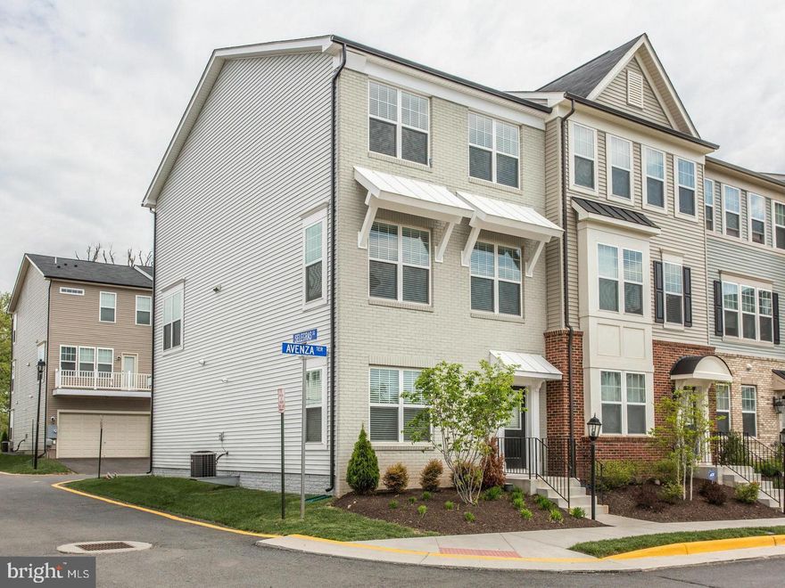 Updated and modern, this lovely Energy Star certified end unit in the interior of the East Gate community is the one to own. The main floor has an open plan with a large living room, gourmet kitchen, a dining room and a family area, all with beautiful hardwood floors that provide warmth and luxury. A beautiful white kitchen with an awesome large center island, granite counters, stainless steel appliances, pantry and recessed lights is exactly what the chef ordered. Light floods the home through the extra windows on the sides. Walkout to the deck in the rear and enjoy the outdoors. The upper level has a master suite with an updated bath that include dual vanities, large floor and wall tiles as well as a walk-in closet with custom fitted shelving. The other two bedrooms on this floor also include custom closet shelving. The updated hall bath and a laundry room round of the top floor. The entry level, which is fully above ground, has a spacious family/recreation room with windows on both sides. Impeccably maintained and freshly painted, this is a move in ready home. East Gate has great community amenities including a pool, courts and a tot-lot. The location is undeniably fantastic – close to the Fairfax county border and with easy access to Rt 50, Rt 28, Dulles airport and walkable to Harris Teeter, Starbucks and other stores. The Park and Ride lot with a bus to the Metro is very close by. Within the highly rated Loudoun county school system.