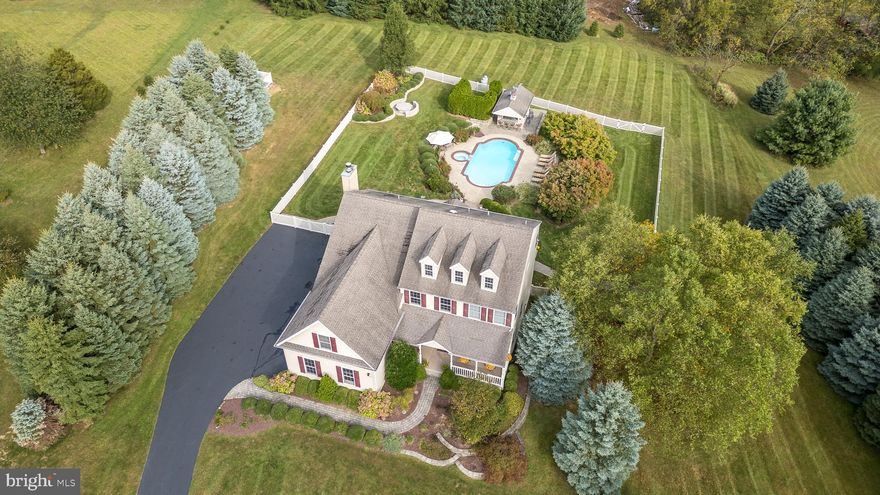 Beautifully maintained home on a cul-de-sac road with extensive landscaping, hardscaping, pool, hot tub, fenced in rear yard and walk out basement.  Welcome to 30 Alexander Dr a perfectly placed home, back from the road, with an extensive private back yard perfect for entertaining.   As you walk up the path to the front door you know you are somewhere special with a covered front porch perfect for your rocking chairs.   Enter the home to the two-story foyer with a chandelier lift.   There is a living room that opens to the formal dining room with new flooring, tray ceiling and shadow boxes.   The spacious kitchen has tile floors and opens to the family room with a stone wood burning fireplace and wall of windows.   There is a lovely morning/sun room that is flooded with natural light and is perfect for enjoying your morning coffee.   Radiant heated tile floors run throughout the kitchen, family and sun room and a half bath completes the first floor.   Upstairs you will find a large master bedroom suite with a sitting room and three closets including a large walk in.  The master bath features a soaking tub, skylight, tile shower, 2 sinks, vaulted ceiling and a bidet!  Three more bedrooms, a hall bath and laundry room are found on this level.   The walkout basement has a lovely full bathroom and space for all your storage, hobbies or is ready to be finished for additional living space if desired.   Built for entertaining the rear of the home and property is nothing short of spectacular.   Starting with the Azek deck with integrated lighting that runs the full width of the house to the beautiful pool with a built-in hot tub.   Drinks are served up from the pool house with 60amp electric service.   As night falls everyone will be gathering around the hardscaped propane firepit.   There is a three-car attached garage with an epoxy coated floor and slat wall system making organization a breeze.  Did I mention the whole house generator?   Located in award winning Palisades School District this home provides everything your family has been looking for and the best the Upper Bucks County has to offer!