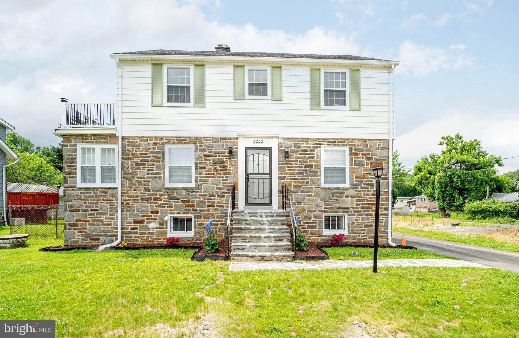 Located in the sought-after Milford Gardens community, this completely reimagined colonial is a showstopper from the moment you arrive. A stunning stone façade and elegant walkway lead you to the front entrance, setting the tone for what lies within, an extraordinary blend of modern luxury and timeless design.
Every inch of this home has been thoughtfully renovated from top to bottom with high-end finishes and a sophisticated palette. Step inside to find fresh, bright designer paint and wide-plank luxury grey flooring that flows throughout. The main level is anchored by an expansive living room featuring an elegant tray ceiling, recessed lighting, and a striking accent wall that adds just the right amount of drama.
Just off the living room, a window-lined sunroom offers the perfect setting for morning coffee, quiet reading, or hosting guests in style. The heart of the home is the gourmet kitchen with polished marble floors, sleek black stainless steel appliances, granite countertops, a gleaming backsplash, and crisp white built-in cabinetry. A rear door offers seamless access to the backyard, and the adjacent formal dining room is designed for effortless entertaining.
A main-level bedroom with a built-in closet and ceiling fan provides flexible space for guests or home office use, complemented by a beautifully updated full hall bath.
Upstairs, an airy loft-style second living area with a designer ceiling fixture and accent wall opens to a private balcony, ideal for quiet evenings or starry nights. The spacious primary suite includes a walk-in closet and a luxuriously updated full bath with modern fixtures and a shower-tub combination. Each of the two additional bedrooms on this level are generously sized and includes its own stylish en-suite bath!
Continue up to the fourth-level loft, a charming and versatile space filled with natural light from a large window—perfect as a playroom, reading nook, studio, or bonus home office.
The fully finished basement extends the home’s living space with a large recreation room, complete with a built-in bar perfect for entertaining. A separate laundry area, oversized utility/storage room, and an additional bedroom or flex space complete the lower level.
Outdoors, the fenced backyard provides a private retreat for play or relaxation, while a detached garage offers both parking and additional storage.
Move-in ready and filled with light, this one-of-a-kind residence offers modern elegance, practical design, and luxurious detail on every level. Conveniently located near MD-26, I-695, shopping, dining, and essential services, this home is as functional as it is fabulous—a rare gem in Windsor Mill.