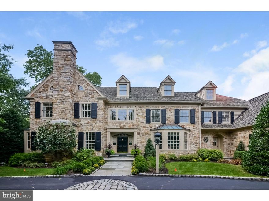 This stately Manor Home is located on a cul-de-sac in the desirable community of Harriton Farm. The impeccable handcrafted Pohlig Built home boasts spacious, light filled rooms, remarkable architectural features and meticulous attention to detail. Beautifully appointed and upgraded throughout, this remarkable residence includes a Marble floored Center Hall, formal Living Room with wood burning fireplace and bay area, french doors to the handsome library with cherry paneling and bookshelves. The extra-large gourmet Kitchen with Kountry Kraft cabinetry and high end appliances, features an over-sized quartz island, with seating, a Breakfast Room with a vaulted beamed ceiling, a Family Room with a gas brick fireplace and custom cabinetry and bookshelves. The Formal Dining Room features decorative moldings and adjoins a Butlers Pantry with copper sink. The second floor includes a Master Bedroom Suite with sitting room, large custom closets and luxurious spa-like bathroom, with Jacuzzi tub, double sinks and extra-large shower. There are three additional bedrooms with two additional full baths. A fifth bedroom is possible in the unfinished room off the main hall. Laundry facilities are located at the rear of the main hall, and a computer area is situated outside the Laundry Room. The premier lot is the cornerstone of this home. The view is incomparable, along with three seating areas and stone fountain.