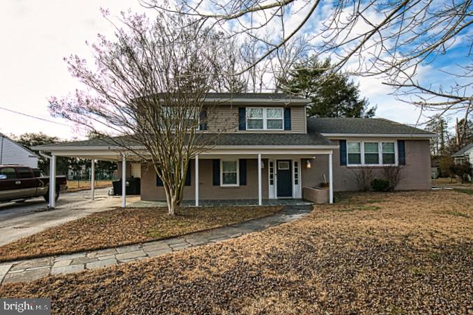 Back on the market! Septic repairs have been completed, including new distribution box, drainfield repair, and tank pumping. System is working and ready for new buyers! Welcome to peaceful living at its finest in this stunning split-level home, conveniently located close to the city yet free from city taxes. As you enter the main floor, you're greeted by a spacious 24x13 family room adorned with a ceiling fan, electric fireplace, and plush carpeting, creating a cozy atmosphere for relaxation. The nearby laundry room boasts tile flooring for easy maintenance, while the adjacent office/entertainment room and half bath feature durable LVP flooring. Ascend the wooden steps to the first floor, where you'll find a beautifully appointed kitchen featuring granite countertops, LVP flooring, a built-in microwave, stainless steel appliances, and light gray custom-built cabinets. The kitchen seamlessly flows into the dining room, offering a view of the outside deck, perfect for alfresco dining. Continue into the 24x13 living room, complete with LVP flooring and a ceiling fan, ideal for gatherings and entertaining. The second floor is home to three bedrooms and two bathrooms, each equipped with ceiling fans for added comfort. The master bathroom boasts custom tile flooring and a tile shower, providing a touch of luxury to your daily routine. Step outside and unwind on your 12x16 deck, surrounded by the privacy of your backyard oasis. Conveniently located near the city park, schools, universities, mall, and restaurants, this home offers the perfect blend of tranquility and accessibility. Don't miss the opportunity to make this your dream home – schedule your tour today!