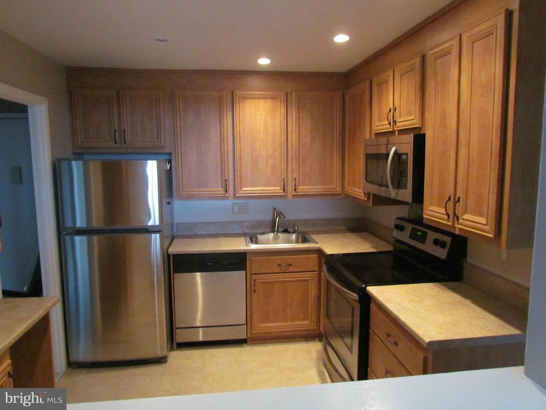 Great location, fabulous view of downtown Towson...walking distance to mall and restaurants. This 2 Bed, 2 Full Bath upper level condo that has just been updated, new bathrooms, tile in kitchen, SS Appliances, freshly painted and upgraded carpet cleaned and in unit W/D. There are many amenities here, security doors, intercom system, pool, tennis, and much more.