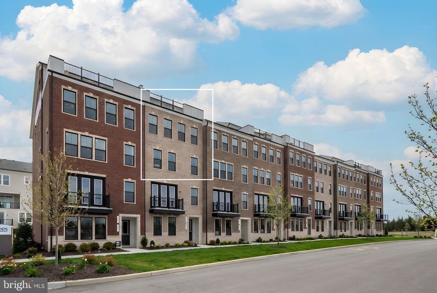 Step into modern luxury and effortless convenience with this stunning townhome‑style condo in the highly coveted Goose Creek community of Ashburn—a location that continues to be one of Northern Virginia’s most desirable places to live, work, and play. 

This home doesn’t just offer a place to live; it delivers a lifestyle that today’s buyers are actively seeking. Perfectly positioned for walkability and connectivity, residents enjoy immediate access to boutique shops, popular dining spots, fitness studios, and the vibrant town center, all just steps from the front door. Commuters will love the quick access to major routes, the Silver Line Metro, and local transit options, making daily travel smooth and stress‑free.Inside, the SKYE model impresses from the moment you enter. 

The open‑concept main level is designed for both comfort and style, featuring a spacious family room that flows seamlessly into a contemporary chef‑inspired kitchen. With its white shaker‑style cabinetry, expansive Quartz countertops, stainless steel appliances, and a massive walk‑in pantry, this kitchen is built for both everyday living and memorable entertaining. The oversized island provides the perfect gathering spot for casual meals, conversation, or hosting friends. Just off the kitchen, the covered deck extends your living space outdoors—ideal for al fresco dining, morning coffee, or evening relaxation. A cozy fireplace and additional outdoor storage add even more functionality and charm.Upstairs, the second level is a true retreat. The impressive owner’s suite offers a peaceful escape with its spa‑inspired bath featuring a dual‑vanity layout, a spacious walk‑in shower, a private water closet, and an oversized walk‑in closet that provides exceptional storage. Two additional bedrooms, a versatile loft area, a full bath, and a dedicated laundry room complete the upper level, offering comfort and convenience for family, guests, or flexible work‑from‑home needs  .

But the showstopper of this home is the covered rooftop terrace—a rare and highly sought‑after feature that elevates the entire living experience. This expansive outdoor oasis is perfect for entertaining, relaxing, or simply taking in the breathtaking sunsets and mountain views that make Ashburn such a beautiful place to call home. Whether hosting gatherings or enjoying quiet evenings under the sky, this space adds a unique dimension of luxury and lifestyle.  

With its modern design, low‑maintenance living, and unbeatable location, this home delivers the best of urban‑inspired living within a welcoming suburban community. Goose Creek is known for its walkability, amenities, and strong sense of community—qualities that continue to attract buyers year after year. This property is more than a home; it’s an opportunity to live in one of Ashburn’s most sought‑after neighborhoods while enjoying contemporary comfort, stylish finishes, and exceptional outdoor living spaces.  

If you’re looking for a home that checks every box—location, style, convenience, and lifestyle—this one stands out from the rest. Realtors, get ready: this is the kind of listing that captures attention, sparks excitement, and leaves a lasting impression.