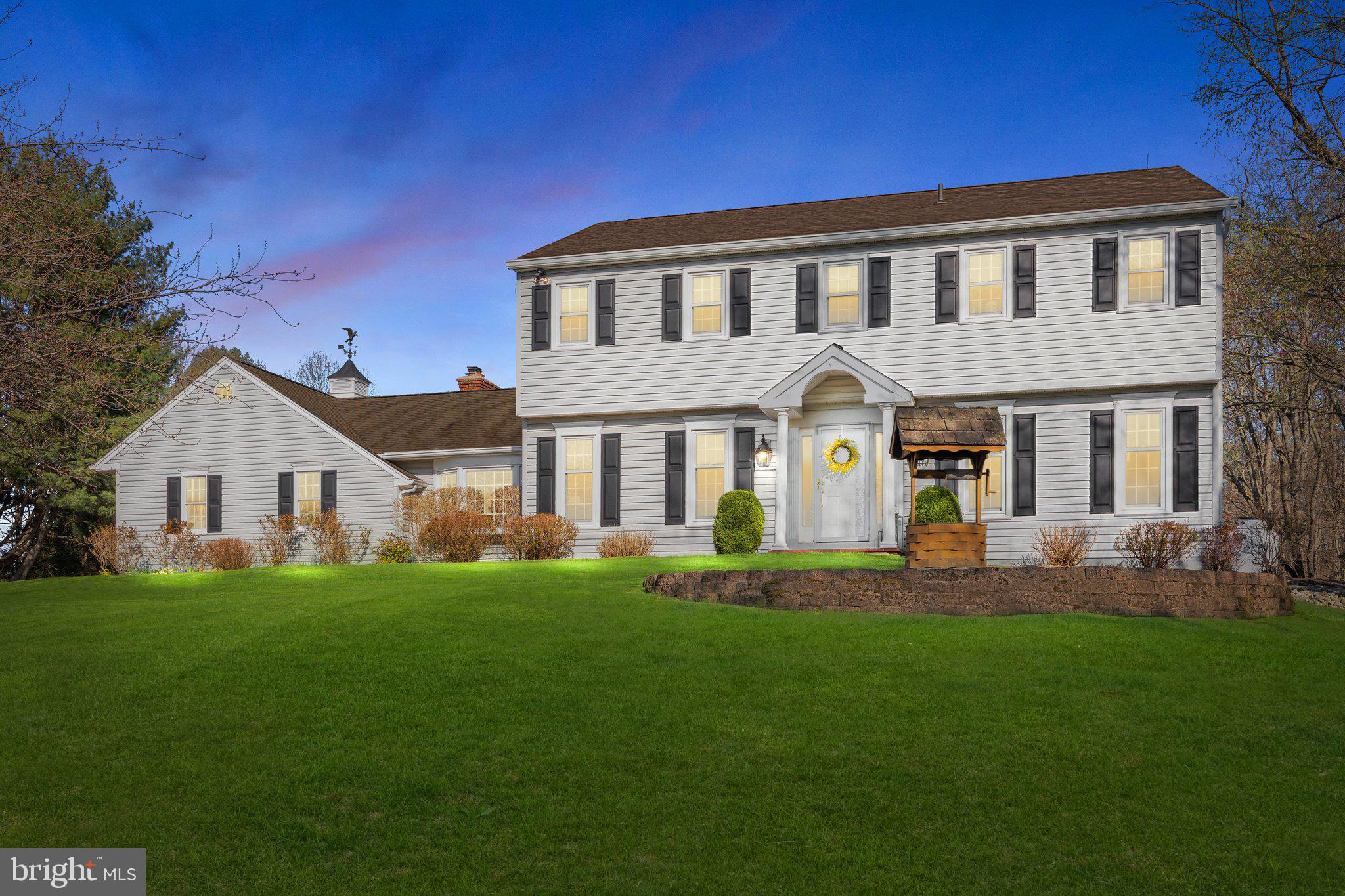 Welcome to your dream home at 85 Brownsburg Road, Newtown, PA! Nestled down a private, cherry blossom-lined driveway, this stunning center hall colonial is a true sanctuary with 4 bedrooms, 2.5 bathrooms on a 2.44 acre lot.
As you approach, the charming brick walkway guides you to a warm and inviting entrance. Step inside and be greeted by a thoughtfully designed foyer, perfectly positioned between the formal dining room and the incredible office featuring a full wall of custom built-ins.
The heart of the home is undoubtedly the custom, eat-in kitchen, featuring double islands, top-of-the-line stainless steel appliances, many pantry cabinets for an abundance of storage, 2 sinks, 2 dishwashers, 36in gas range with hood vent, decorative accent lighting, an electric oven in island, microwave drawer, and exquisite Carrara marble countertops and black leathered granite tops. The uniqueness of this space is further highlighted by wood-planked vaulted ceilings and expansive windows that offer serene views of the backyard. Space for at least 4 barstools along the island and a full breakfast room offer many areas for serving and dining.
The family room, with its cozy atmosphere, gas fireplace, and built-ins, makes an ideal space for relaxation. (Hardwood floors are found under the carpet in this room).
The first level also boasts a convenient laundry room and a stylishly updated powder room. Upstairs, discover four generously sized bedrooms. The primary suite is a luxurious retreat, complete with an updated bathroom featuring a dual vanity, stall shower, and a spacious walk-in closet. The hall bathroom has been tastefully remodeled with new tile and a double bowl vanity.
The finished basement provides fantastic additional living space and ample storage.
Additional highlights include a three-car garage for ample parking, and a large custom-built barn shed that offers extra storage or workshop potential, and a gorgeous, private tree lined yard. Experience the tranquility and modern comforts of this exceptional property—your perfect escape awaits!