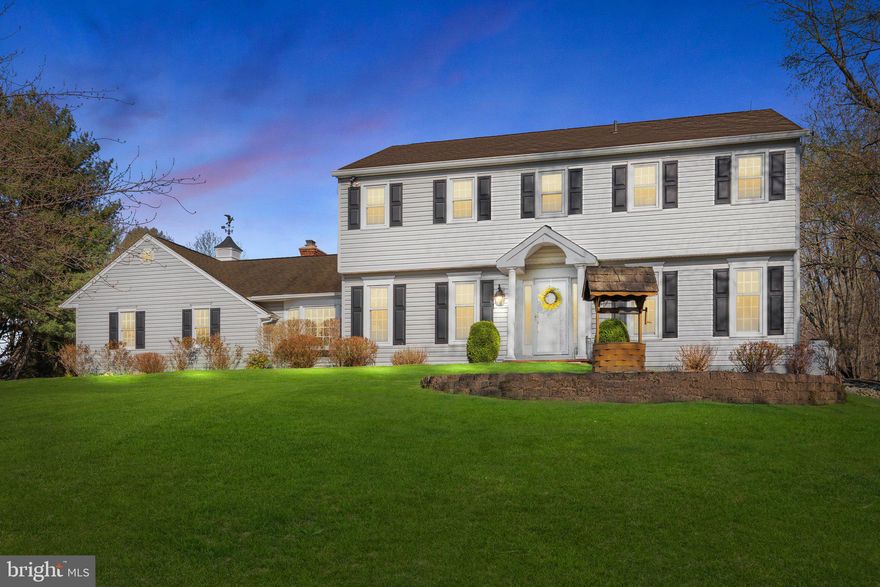 Welcome to your dream home at 85 Brownsburg Road, Newtown, PA! Nestled down a private, cherry blossom-lined driveway, this stunning center hall colonial is a true sanctuary with 4 bedrooms, 2.5 bathrooms on a 2.44 acre lot.

As you approach, the charming brick walkway guides you to a warm and inviting entrance. Step inside and be greeted by a thoughtfully designed foyer, perfectly positioned between the formal dining room and the incredible office featuring a full wall of custom built-ins.

The heart of the home is undoubtedly the custom, eat-in kitchen, featuring double islands, top-of-the-line stainless steel appliances, many pantry cabinets for an abundance of storage, 2 sinks, 2 dishwashers, 36in gas range with hood vent, decorative accent lighting, an electric oven in island, microwave drawer, and exquisite Carrara marble countertops and black leathered granite tops. The uniqueness of this space is further highlighted by wood-planked vaulted ceilings and expansive windows that offer serene views of the backyard. Space for at least 4 barstools along the island and a full breakfast room offer many areas for serving and dining.

The family room, with its cozy atmosphere, gas fireplace, and built-ins, makes an ideal space for relaxation. (Hardwood floors are found under the carpet in this room).

The first level also boasts a convenient laundry room and a stylishly updated powder room. Upstairs, discover four generously sized bedrooms. The primary suite is a luxurious retreat, complete with an updated bathroom featuring a dual vanity, stall shower, and a spacious walk-in closet. The hall bathroom has been tastefully remodeled with new tile and a double bowl vanity.

The finished basement provides fantastic additional living space and ample storage. 
Additional highlights include a three-car garage for ample parking, and a large custom-built barn shed that offers extra storage or workshop potential, and a gorgeous, private tree lined yard. Experience the tranquility and modern comforts of this exceptional property—your perfect escape awaits!