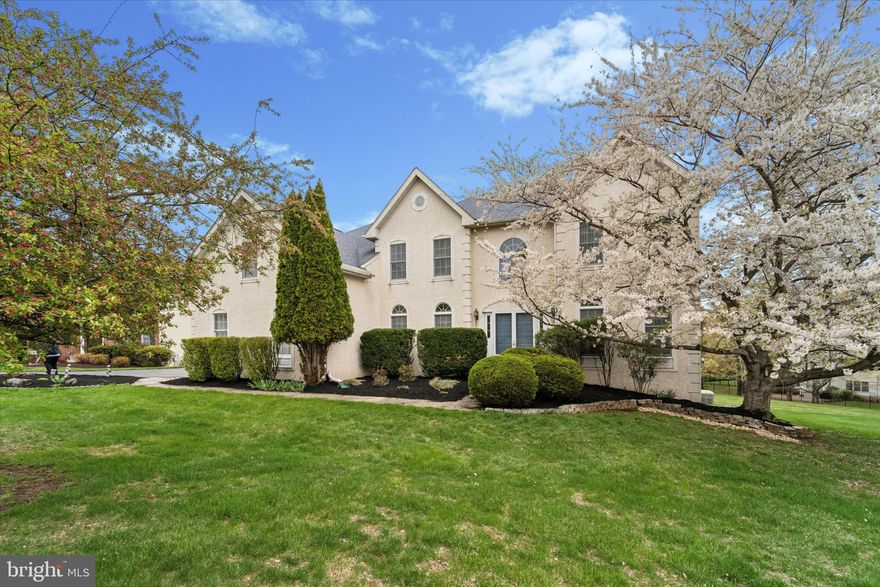 Introducing 5 Anvil Court in Glen Mills. This magnificent two-story colonial home nestled on a tranquil cul-de-sac within the esteemed Garnet Valley School District. As you step through the grand entrance, you’re greeted by a stunning two-story foyer adorned with rich hardwood floors and a gorgeous crystal chandelier, leading to inviting formal living and dining rooms. The gourmet kitchen is a chef’s paradise, featuring a spacious island, elegant 42" white cabinetry, gleaming granite countertops, a generous pantry, and an exit to a large deck that overlooks a serene, private backyard. Just off the kitchen, you'll find the inviting family room, characterized by its stunning vaulted ceiling that creates an airy and spacious atmosphere. This bright and open area is perfect for gathering with family and friends, whether for cozy movie nights by the  gas (marble surround) fireplace  and lively conversations. Large windows allow natural light to flood the room, enhancing the sense of openness and comfort. The family room seamlessly connects to the kitchen, making it easy to entertain and keep everyone engaged during social events. Its design not only fosters togetherness but also adds a touch of architectural elegance to this lovely home. Retreat to the luxurious main bedroom suite, which boasts a cozy sitting area, a spacious walk-in closet, and a beautifully appointed bath complete with a separate shower, indulgent soaking tub, and double sinks. Just down the hall, you’ll find a delightful princess suite with its own full bath, as well as two additional well-sized bedrooms sharing a Jack and Jill bath. The main level also offers a private study which includes a computer desk, a convenient laundry room, and access to a three-car garage. Expanding your living space, the finished basement offers nearly 2,000 square feet of additional area, featuring a bar, full bathroom, and ample storage, with daylight and walkout access to the yard. This home is equipped with two-zone heating and air conditioning, with one HVAC system newly installed in 2024 and the second heater updated in 2017. Additional features include a whole house fan, side-entry three-car garage, a private half-acre lot, a spacious back deck, hardwood floors, a house generator, Sprinkler System, and a new roof installed in 2015. Also included in the sale is the snow blower and the Elliptical. Located just minutes from major routes like Rt 1, Rt 202, and 476. As well as the Shoppes at Brinton Lake, you’ll have access to an array of shopping and dining options. Enjoy the perfect blend of comfort, convenience, and style in this exceptional property!