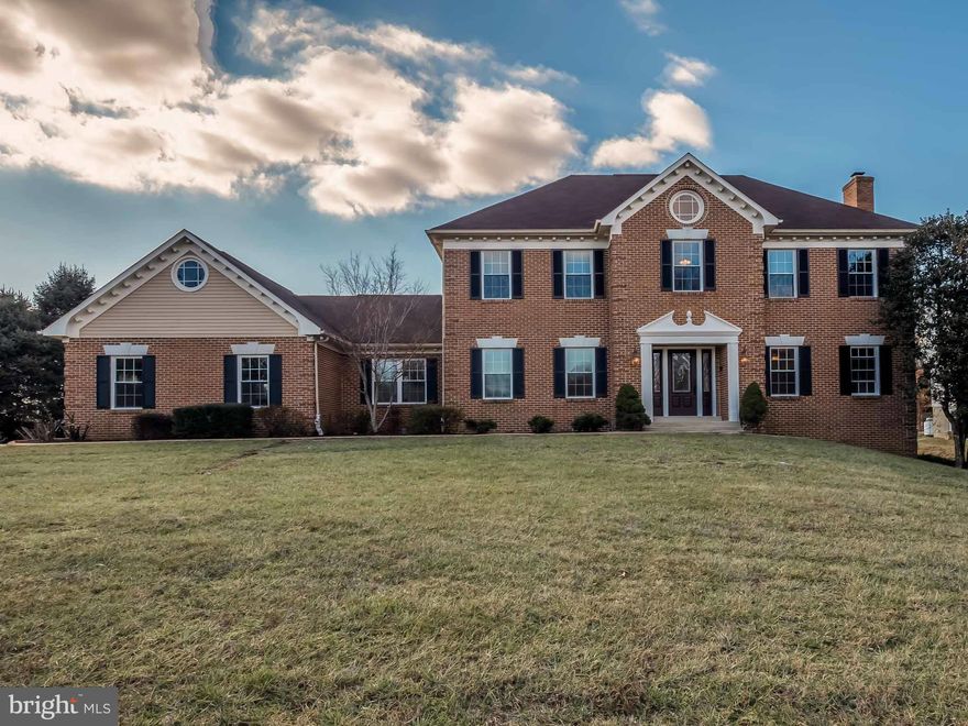 72 Hr KO!Stunning Brickfront home offering 4 Bedrms, 2 Full ,2 1/2 baths. 3 finished levels on 1.2 acre. Hardwd flrs, gourmet kitchen w/ new stainless appliances &  granite. 2 new heat pumps w/ warranty. Master Suite w/ custom glass shower surround, tile & free standing tub. Extensive Deck off of kitchen, new canvas awning & patio. Paved driveway, 3 car garage. short distance to DC, VA & Ann