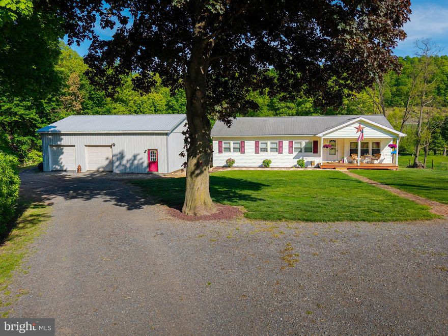 Welcome to 2233 Cumberland Road! Nestled on two acres, this beautifully updated single level home offers a rare blend of comfort, simplicity, and practical living space. Featuring three spacious bedrooms, two full bathrooms, a large living room, a well-appointed kitchen perfect for preparing meals, and lovely dining room ideal for entertaining. Breathtaking views from every angle, especially from the front porch. Cool off in your own above ground pool during warm days. The large, detached garage, equipped with heat, provides ample space for vehicles and outdoor equipment. The outdoor furnace, fueled by wood or coal, heats both the house and the garage. The expansive private yard offers endless possibilities, including the potential for keeping animals. With a private well and sewer system, this property is conveniently located just minutes from Bedford, ensuring an easy commute to town or Cumberland, MD. Could this be your next Home Sweet Home?