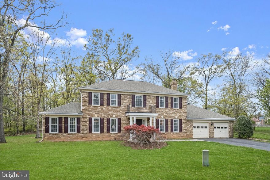 Charming Home in the Forest Ridge Community of Sterling, VA!  Welcome to this beautifully maintained home nestled in the desirable Forest Ridge neighborhood of Sterling. From the inviting brick exterior and pristine landscaping to the oversized 2-car garage, this home offers timeless curb appeal and a traditional layout ideal for both everyday living and entertaining.  Step inside to find luxury laminate flooring flowing throughout the main level, where an abundance of natural light fills the formal living room, complete with dentil crown molding and chair railing. French doors open to a private office—perfect for remote work or study.  The kitchen is a true chef’s delight, featuring ceramic tile flooring, granite countertops, stainless steel appliances, soft-close cabinetry with pull-out drawers, and a cozy breakfast nook overlooking the serene patio and lush backyard. Just off the kitchen, the spacious family room invites you to relax by the wood-burning fireplace with its unique brick surround and elegant crown molding.  Upstairs, the primary suite offers a peaceful retreat with neutral tones, luxury laminate flooring, a large walk-in closet, and a private en-suite with a dressing area, vanity, linen closet, pedestal sink, and walk-in shower. Three additional bedrooms and a full hall bath complete the upper-level living quarters.  Conveniently located near major commuter routes including I-495, I-66, VA-267, and US-50, with easy access to Washington, D.C., shopping, dining, and local parks—this home truly has it all!