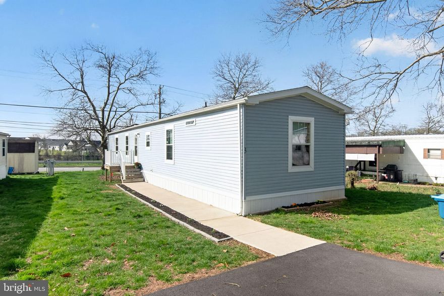 Move-in ready and beautifully updated 3BR/1BA home in desirable Oxford Village! Featuring hardwood floors throughout, upgraded LED lighting, and a fully renovated kitchen with bright white cabinetry, stylish countertops, and a center island with breakfast bar—perfect for everyday living and entertaining. The kitchen opens to a spacious family room, creating a functional, open feel. The primary bath offers a walk-in shower with dual shower heads for a spa-like experience and added accessibility. Three generously sized bedrooms complete the home. Conveniently located near the YMCA, shopping, dining, and everyday essentials, with easy access to Route 1 for commuting to Maryland and Delaware. Low-maintenance living in a prime location—schedule your showing today!