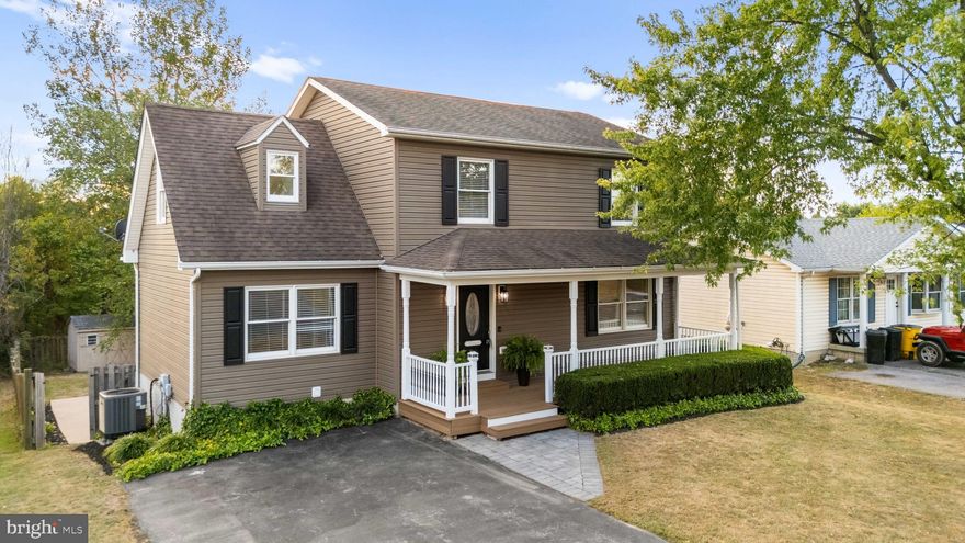 Welcome to 108 Bane Berry Lane, a spacious 4-bedroom, 2.5 -bath home designed for comfortable main-level living. The primary suite is conveniently located on the first floor with a private bath, while three additional bedrooms upstairs provide plenty of room for family or guests. The open-concept main level features a modern kitchen and living area with stylish finishes, perfect for everyday life and entertaining. A finished lower level adds flexible space for recreation or storage. Outdoor living is just as inviting, with a Trex deck overlooking the backyard, a patio below, and a welcoming front porch. With updated features, generous living areas, and easy access to shopping, schools, and commuter routes, this home is move-in ready and built for convenience.