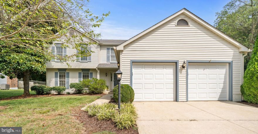 What you have been waiting for - a pristinely maintained home in Riva Trace! 
 The welcoming entry leads you  to the open kitchen with dining area. Both this area and the adjacent family room have sliding doors to the deck and yard, perfect for running, playing and memory- making entertaining. The formal living  and dining areas with beautiful hardwood floors and crown molding. Mudroom/laundry room  off the garage makes life so much easier.
Upper level features a primary bedroom with en-suite bath and custom walk in closet, plus 3 additional good size bedrooms and full hall bath.
 The lower level offers a recreation room , a den/study with full bath, in addition to a large storage area. Home also features a newer roof . High efficiency heat pump.

Sidewalks for biking and walking the dog, Riva Trace's dock and kayak area with tables for picnicking, pickleball and tennis courts and a tot lot - these are just a few of the communities' amenities - and it's less than a mile to Route 50/665, shopping. HOA fee is $450 biannually and $100 for Autumn Chase once a year.