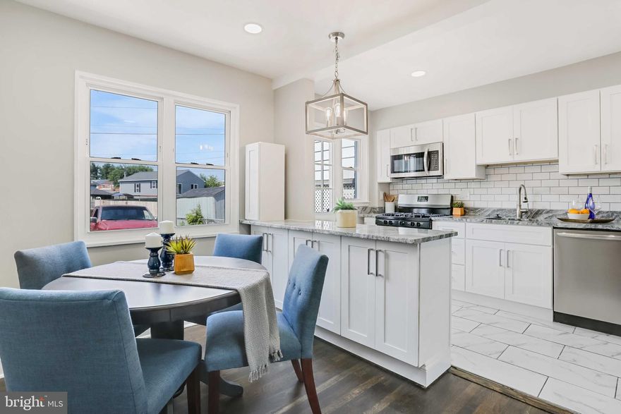 ***A gravel parking pad and fence have been added since the listing photos have been taken.***This home is the definition of complete renovation. The builder who crafted this home is famous for his attention to detail and meticulous craftsmanship. The original oak floors have been refinished and stained espresso. These hardwoods flow throughout the main and second level of the home. Walk down the front walkway onto the shaded porch and into the front door to find a living room that is open to the dining area on the back of the home that flows straight into the kitchen. Up the oak staircase find two spacious bedrooms with a full bathroom. Each bedroom has plenty of room for storage with sizable closets in each. Climb down a wide stair case to the basement into a large and open room that can be used as a second living space, office, bedroom, or at-home gym. Enjoy the convenience of a full door egress to the backyard from the basement level. The backyard offers a nice area to entertain guests and there is even room for a private parking pad. Merritt Park Shopping Center, Texas Road House, and all that Merritt Boulevard has to offer are only a 5 minute drive from 3319 Belsford Ct