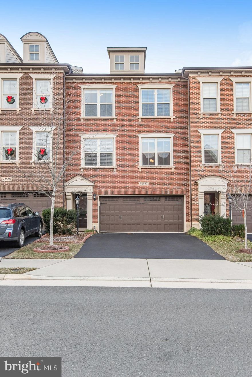 This sunny and spacious brick-front 3-bedroom, 3.5-bathroom townhome in the highly desirable Brambleton community. It features a bright, open floor plan with recessed lighting throughout the main and lower levels. The kitchen boasts granite countertops, upgraded stainless steel appliances, a large island, and ample cabinet space. The upper level offers generous-sized bedrooms, and the washer and dryer are conveniently located on this level. The expansive lower level includes a full bath and a walkout to the fenced backyard.
The home is ideally located close to Dulles Airport, Route 28, and the Dulles Greenway, with Verizon FIOS Internet and cable included in the rent. Please note, no pets are allowed.  Move-in ready.