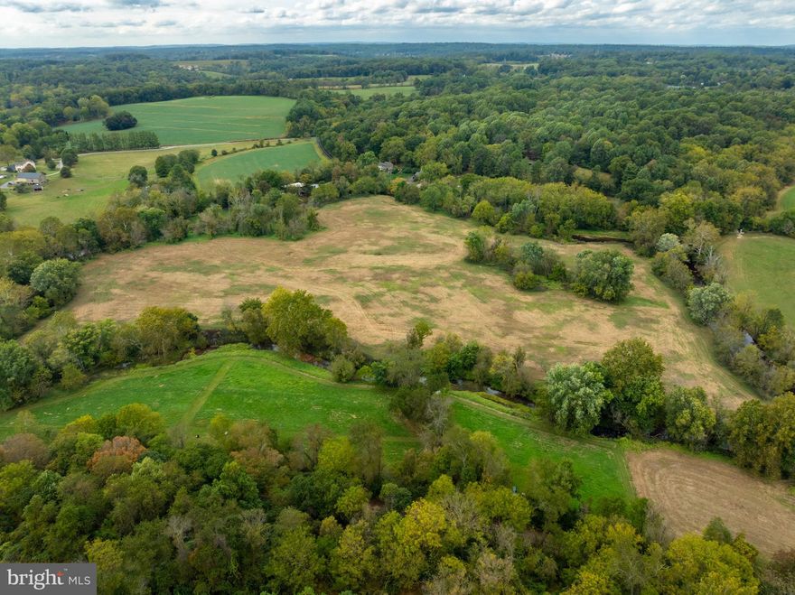 Welcome to 10 Trimbles Ford, a rare opportunity to own 34 acres of Chester County countryside in the heart of the Brandywine Valley. There are 4.4 buildable acres and the rest are to be used for pastures/open space (they are non sub-dividable not to be built on!) This remarkable property offers unmatched privacy and natural beauty, surrounded by preserved land and nestled within the Brandywine Radnor Hunt Club territory.
Enjoy pastures perfect for horses, livestock, or agricultural use, along with 34 acres of cleared land ready for your dream home. The property features direct access to the Brandywine Creek, where you can launch a canoe or kayak and enjoy fishing in trout-stocked waters.
Located less than a mile from the Brandywine Red Clay Preserve, this property offers an ideal balance of seclusion and convenience. You’ll be moments from Northbrook, Marshallton Village, and scenic walking and riding trails, yet only a short drive to the vibrant amenities of West Chester.
Whether you’re envisioning an equestrian retreat, a private nature sanctuary, or a luxury estate surrounded by open space, 10 Trimbles Ford is truly a slice of heaven in one of Chester County’s most coveted settings