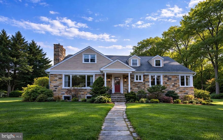 Charming Cape Cod–style home nestled among lush greenery, offering a warm and welcoming setting with generous living space throughout. The first floor features an open, airy layout where the kitchen and dining areas flow seamlessly together—perfect for hosting gatherings or enjoying everyday moments at home. Just off the dining room, a private patio creates an ideal setting for outdoor dining and entertaining during the warmer months, extending the living space outdoors. A conveniently placed powder room off the living room adds comfort for both residents and guests.

A private first-floor primary suite with a five-piece en suite bath provides a peaceful retreat, while an adjacent room offers flexibility as a home office, cozy den, or additional bedroom—ideal for today’s lifestyles.

The finished basement expands the home’s living space with versatile areas suited for a playroom, media room, home gym, or guest accommodations, complete with a full bathroom and egress.

Upstairs, three spacious bedrooms and two full bathrooms provide ample room for family and visitors. A large side yard offers exceptional privacy and is a dream for garden lovers—perfect for relaxing, planting, or enjoying nature year-round.