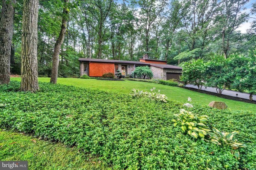 Private and serene is the setting for this 1 Story living.  Beautifully maintained, the exterior includes a Trex Deck, a Patio, a Fountain and a Pond.  The interior has hardwood floors, vaulted ceilings, granite countertops with a porcelain tile backslash, skylights, 1st Floor Family Room and a Sunroom ( each with it's own Fireplace).    There is access to the Basement from the Garage and inside the home, Recessed lights, bike racks, Shed, Gutter Covers.  Detail in Associated Docs, Large storage area above the garage.