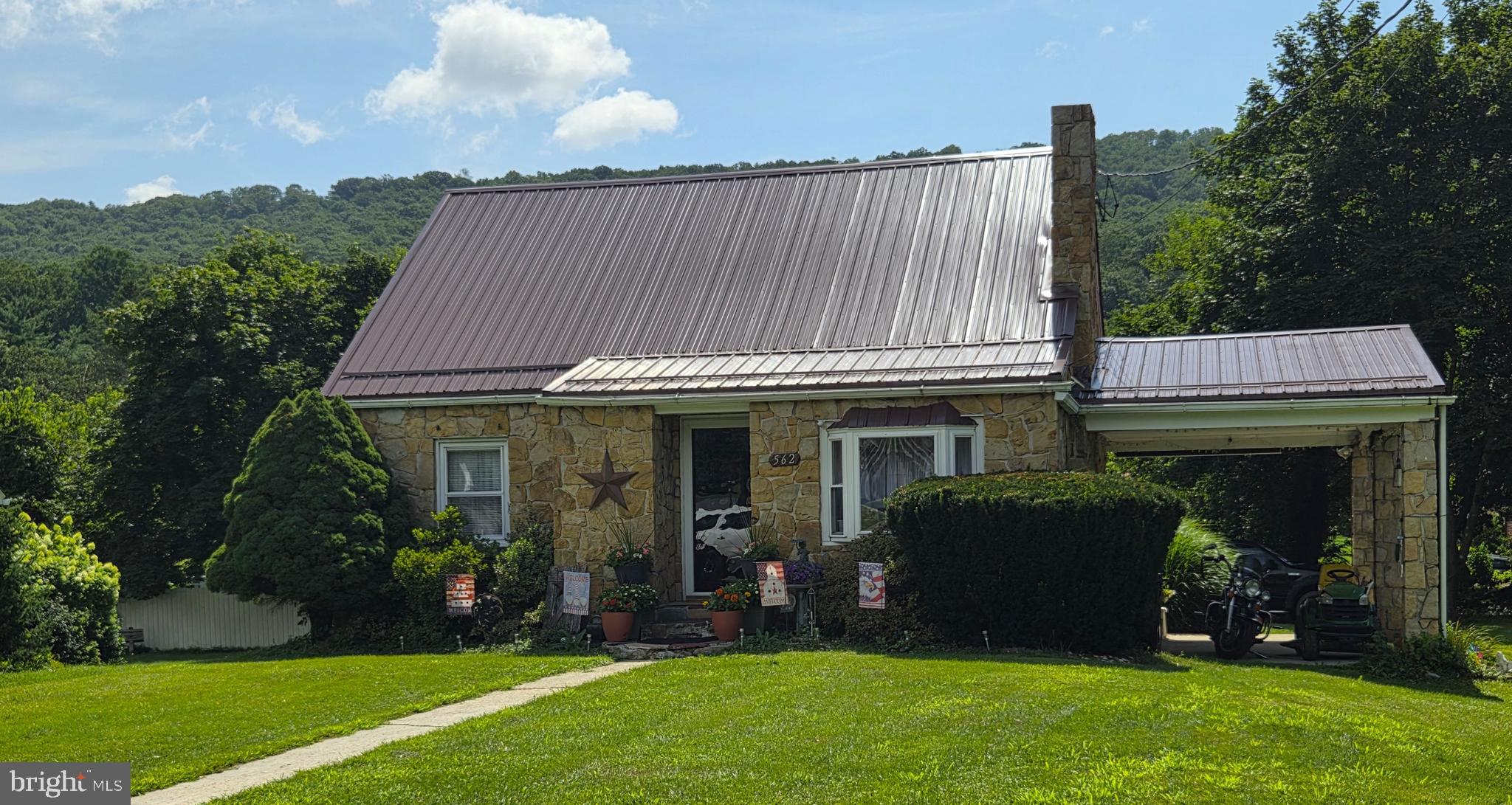 HOT NEW PRICE-CHARMING CAPE STYLE HOME IN THE MIDDLE OF LAVALE - NICE KITCHEN - STONE EXTERIOR - NICE METAL ROOF -VERY NICE LOT - REAR DECK AND PATIO AREA - FORMAL DINING ROOM - BASEMENT IS MOSTLY FINISHED AND IMPROVED WITH OUTSIDE AND INSIDE ACCESS - ABSOLUTELY CONVENIENT LOCATION - ACCESS FROM NATIONAL HWY AND BRADDOCK AVE - VERY NICE - APPOINTMENT REQUIRED BUT EASY TO SHOW - 20X10 STORAGE SHED INCLUDED. THIS IS A BEAUTIFUL HOME
