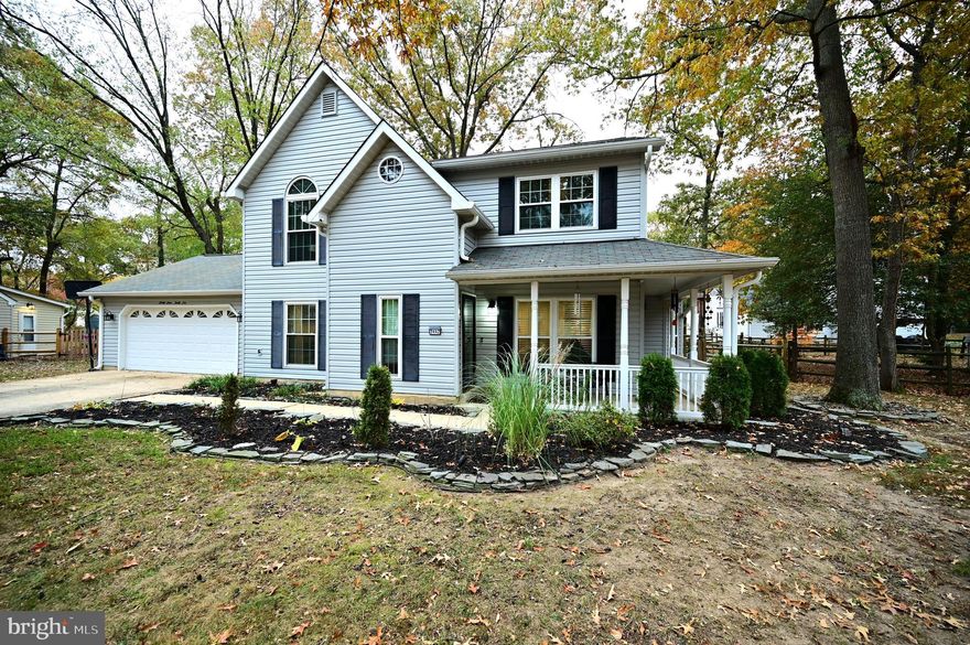 BEAUTIFUL THREE-BEDROOM COLONIAL! Come enjoy this well-maintained home nestled in the heart of Waldorf, MD - St Charles - Huntington neighborhood!  Community amenities include a swimming pool, tennis/pickleball courts, playgrounds and community center. This home has a picturesque, nicely landscaped cul-de-sac lot and features three lovely bedrooms, two full baths, a half bath, separate dining and living rooms, family room, spacious kitchen, and a 2-car garage!  The welcoming wrap-around porch, the entertainment platform deck and backyard patio - are all ideal for relaxing and entertaining for any season!  The kitchen offers granite countertops with matching backsplash, stainless appliances, butler's pantry, built-in shelving, dining table space and extra breakfast bar counter seating.  French doors lead to the backyard deck and patio. Lots of space to spread out in the spacious separate living room with bright windows for natural lighting. Enjoy TV time in the family room just off from the kitchen.  Special meals and gatherings are ideal for the separate formal dining room - or can use the room as flex space for a home office, craft room, exercise room or playroom!  Primary bedroom with vaulted ceilings, walk-in closet and attached full bath.  Amble closet space in the additional large bedrooms just down the hallway. Lots of storage closets throughout the home and pull-down attic space. Other great features recessed lights, newer dishwasher, updated luxury vinyl flooring on main level and newer carpet on stairs and upper-level hallway and bedrooms. Washer and dryer conveniently located upstairs.  Wall heating unit and shelving in the oversized 2-car garage - an ideal workshop space! Large backyard shed - perfect for lawn equipment and tools.  Commutable to military installations (Andrews AFB, Bolling AFB, Ft. Meade, Ft Belvoir, Indian Head Naval, Dahlgren Naval and the Pentagon).  Convenient to park and ride, commuter bus stops, MGM National Harbor, Tanger Outlets, Waterfront National Harbor, Washington, DC and Northern VA.  Easy access to local and major highways (Hwy 301/Crain Hwy, Rt 5/Branch Ave, Hwy 210/Indian Head Rd, MD 5/Leonardtown Rd, I-95/495 Capital Beltway). Close proximity to shopping, eateries, schools, colleges, medical centers, walking/jogging/biking trails, recreational parks, sporting and entertainment venues... plus more! Schedule a tour today!