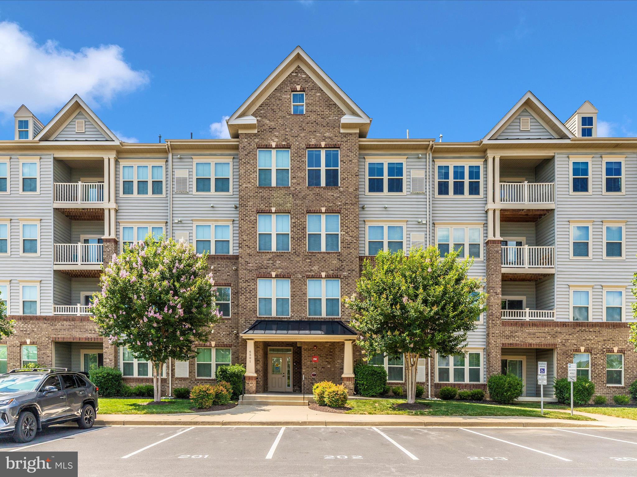 Welcome to this beautiful two bedroom, two bath condo in the sought after Linton at Ballenger community. This home features high ceilings, an open floor plan, and an abundance of natural light throughout. The spacious kitchen is perfect for entertaining, offering an island, granite countertops, 42 inch cabinets, and like new stainless steel appliances. One of the few units with a cozy gas fireplace, this condo also boasts plenty of windows and a semi private view from the balcony, perfect for quiet mornings or evening relaxation. The primary suite offers generous natural light, multiple storage closets, and a walk in shower. Both bathrooms are beautifully finished with tile. Enjoy fantastic community amenities including a pool, tot lots, rec room, and gym. Conveniently located close to shops, dining, and commuter routes, this home is move in ready and waiting for you.