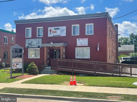 Photo of 1017 University Boulevard E, TAKOMA PARK, MD 20912 (MLS # MDMC2229384)