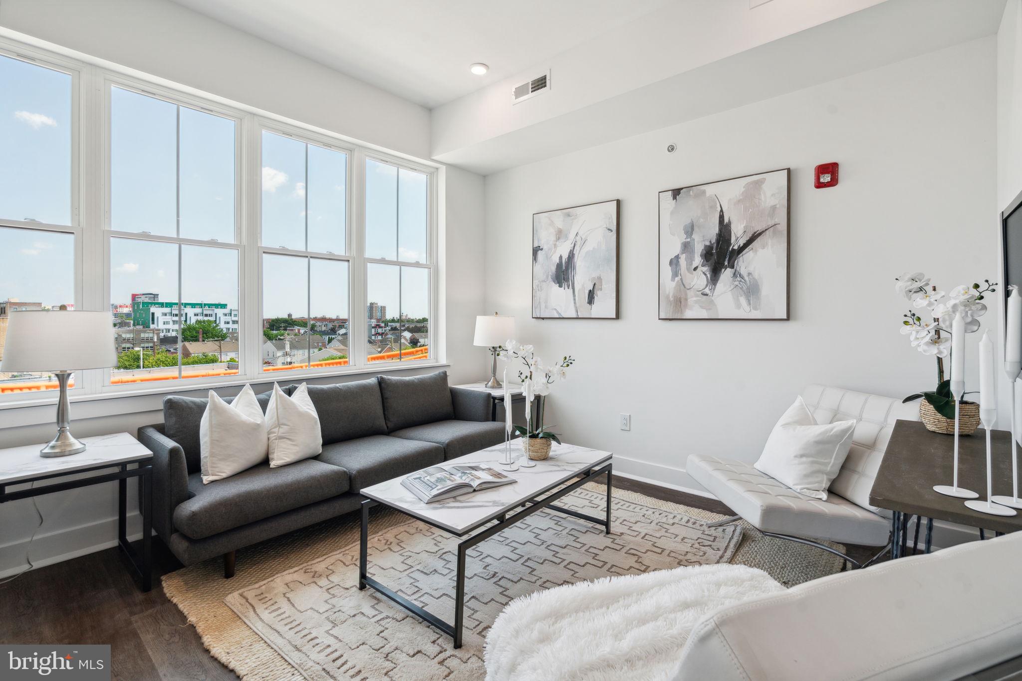 *Available 10/1!*
Welcome to the ‘Eight13 on Broad’ (813 N Broad St), a stunning new apartment community nestled in one of Philadelphia’s most dynamic neighborhoods. This contemporary 63-unit building is ideally situated just blocks from the bustling commercial corridors of N Broad St which includes Aldi, Santucci’s, Osteria and the iconic Met. Surrounded by convenient public transportation routes, these apartments boast ample living space and features central air, in-unit laundry, brand new stainless steel appliances, quartz countertops, and oversized windows allowing great natural light. The building also provides residents with a free on-site fitness center, shared bike storage, optional on-site gated parking and roof deck access to enjoy breath-taking views of the city. Discover the perfect blend of modern living and urban convenience at Eight13 on Broad. Book your tour today!
Lease Terms: Generally, 1st month, and 1 month security deposit due at, or prior to, lease signing. Other terms may be required by Landlord such as last month’s rent upfront. $65 application fee per applicant. electricity, gas (if applicable), cable/internet and $10/mo technology fee. Water is a flat monthly fee of $60. $25 service fee plus cost of the air filter will be charged quarterly for routine air filter replacement. Landlord Requirements: Applicants to make 3x the monthly rent in verifiable gross income, credit history to be considered, no evictions within the past 5 years, and must have a verifiable rental history with on-time rental payments. Exceptions to this criteria may exist under the law and will be considered. Cosigners will be considered.
*Pets are conditional on owner’s approval and may require an additional fee; 1 Dog under 35 lbs. – $350 NRF pet fee + $50/mo OR 1 Cat – $350 NRF pet fee + $50/mo if accepted.
*Photos of a similar unit in the building – finishes will match, layout may differ
*Limited Off-Street Parking Availability – Inquire with your showing agent for latest availability and pricing