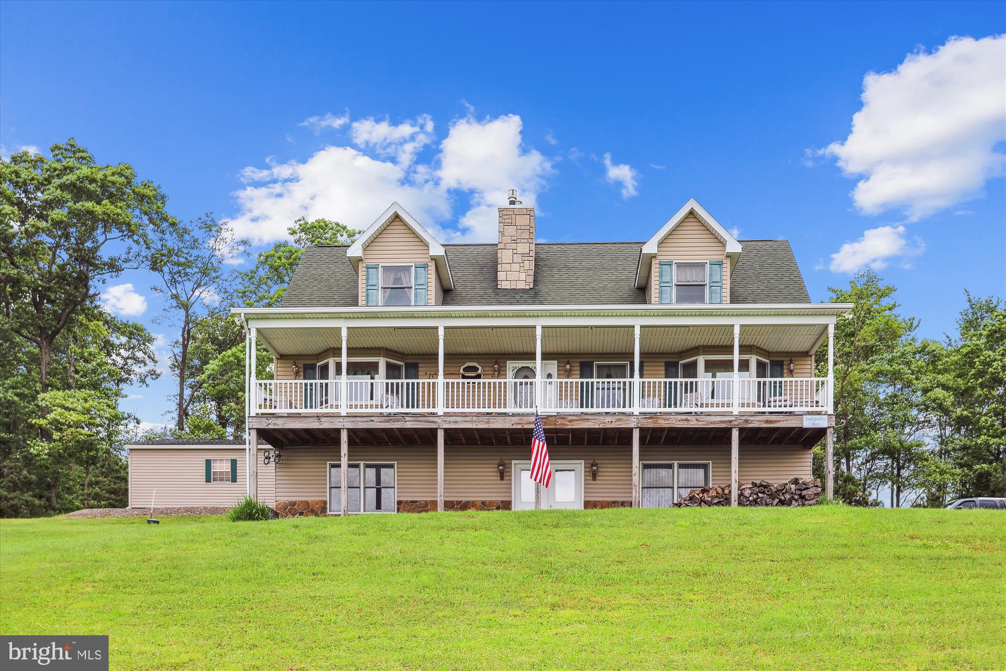 Enjoy serine privacy and seclusion in a unique custom Built Cape Cod home.
Amazing Million Dollar View! Enjoy serine privacy and seclusion in a unique 2 story Cape Cod custom built home. Come up, relax and enjoy the view from the Porch. It is better than any photos we can take. Located minutes away from Wisp and Deep Creek Lake. Great set up for a B &B, bed and breakfast, or large gatherings. Fabulous sunsets in the west. Main level features 1 large bedroom, bay window, 1 & 1/2 baths, Dining Room, Living room has hard wood floors, bay window, Gas fireplace. Gourmet kitchen with double convection ovens, propane cook top an pot filler, so many cabinets, self closing draws, tile floor, breakfast bar, center island. Main level and basement feature radiant heated floors. Laundry room, built in cabinets, Recessed lighting, under cabinet lights, ceiling fans thru out. A 40,000 BTU gas/propane fire place to warm your heart. Walk out on the amazing porch 48 x 10 and relax with the view of 7 mountain ranges and at night it feels like you can reach out and touch the stars with breath taking views, and watching sunsets go down. 2nd level- 2 large bedrooms, dormers made from hickory tongue and groove planking are 6 ft. wide with cozy window seat, and storage. There are 11 closets on this level. Check out the inside of the closets they featuring a unique finish and workmanship. Pull down stairs to attic with a solid foot wide stairways span a 4 foot width. The lower level has Berber carpet and tile flooring with radiant heat. Family room , 4th bedroom, full bath, utility room, boiler system holds glycol instead of water, tankless hot water heater provides constant hot water, abundant storage and shelving. 65,000 BTU's wood burning stove. Whole house 10 kw Generac generator with 15 kw transfer case to handle the whole house and the well. An over size 2 car garage with electric and garage opener. 1000 gal. owned propane tank, saves money on propane because tank is owned. There are so many amenities Near Deep Creek Lake don't miss out. If you lived here you could be there in about 7- 10 Minuets to join the fun like a lake on top of the mountain, skiing, boating, movies, restaurants and come come to serenity and beautiful quiet Sunsets in the west. Privacy and seclusion in a unique Cape Code custom built home.