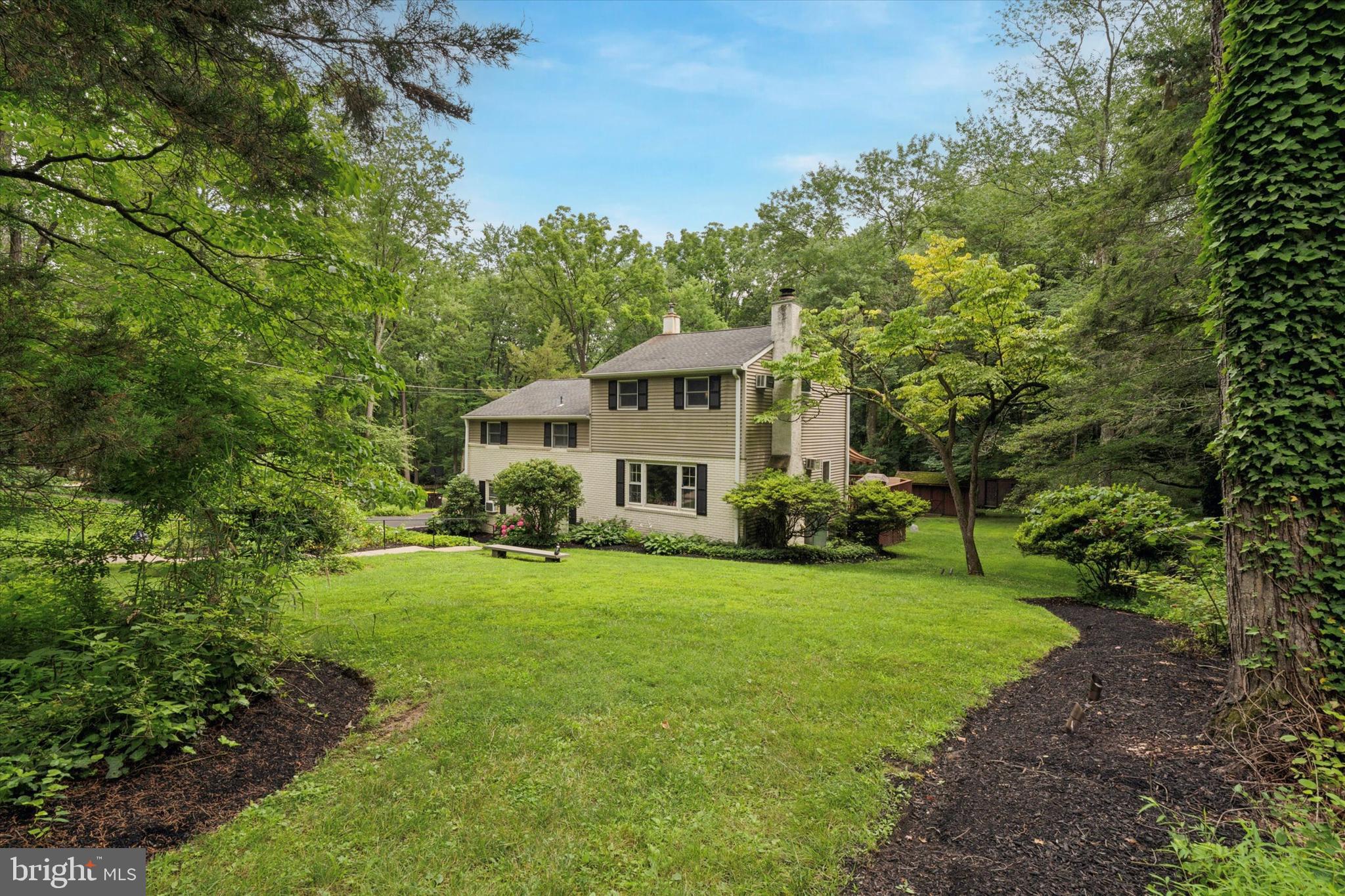 73 Tower Hill Road is nestled into the Tower Hill subdivision, on a beautifully wooded street tucked in just off Easton Road. You’ll have your own private retreat that’s conveniently located just a short walk into Doylestown Borough where you’ll find countless dining, shopping and entertainment options. Outdoor relaxation and entertainment throughout the year will be a highlight of owning this home. In the summer, you’ll have a heated in-ground pool to cool off and relax in, an oversized deck with a retractable awning to shade your late afternoon cookouts, and a patio below for extra entertaining space. Cool evenings and snow days can be enjoyed from the hot tub on the patio, and in all seasons, nature will surround you. Inside the home is a cozy and versatile floor plan with several options to customize the layout to your liking. Entering the home off the driveway, you’ll enter a space that can be used as a sitting room, home office or game room, and there is a sliding door out to the patio from this room. There is also a sitting room, laundry area with access to the crawlspace for storage, and a powder room and separate stall shower (this space could easily be modified to create a 2nd full bathroom. On the main level are a living room with a propane log fireplace, kitchen with peninsula and a dining area with a sliding door out to the deck. From here, you have a birds eye view of the pool, manicured property, and adjoining green space. On the first upper level are a hall bathroom and two bedrooms. Currently one of the bedrooms is shown with a separate sitting area (this space could easily be converted to a 4th bedroom). On the upper level is the oversized primary bedroom, which can be furnished in a number of ways to create your own end-of-the-day retreat. There are many mechanical upgrades to the home, some of the highlights are a whole home backup generator to ensure lighting and comfort in all weather, landscape lighting to illuminate the grounds and the home, newer well pump, newer oil tank, and Hunter Douglas blinds throughout much of the home. With immediate access to Route 202 and 611 and a very short commute to Doylestown Hospital, the location is prime while still having a “tucked away” feel. Come visit 73 Tower Hill Road and find your way home!