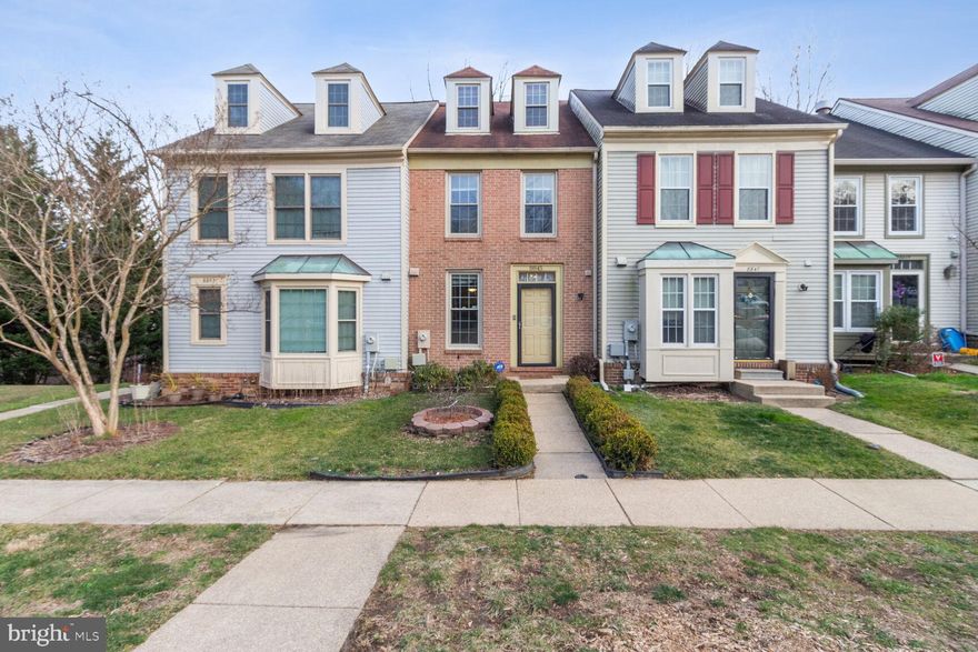 All offers due Monday, Feb. 26 th at 5pm. Welcome to your dream home in the coveted community of Aspenwood, Howard County's hidden gem! This stunning brick townhome has been thoughtfully updated and meticulously maintained, offering a perfect blend of modern luxury and timeless charm.

The main level welcomes you with a beautifully updated kitchen featuring Corian countertops, stainless steel appliances, and freshly painted . The kitchen seamlessly flows into the dining room, providing the perfect setting for hosting gatherings with family and friends. Convenience is key with a main level powder room for guests.

Step outside to the expansive three-level deck, where you can enjoy the serene sounds of the nearby creek and rustling trees. This outdoor oasis is perfect for entertaining or simply relaxing with a cup of coffee in the morning sun.

Upstairs, you'll find two spacious primary bedrooms, each boasting attached remodeled bathrooms with soothing earth tones. One of the bedrooms even features a loft space, ideal for use as an office, craft room, or additional bedroom.

The lower level is a bright and inviting  recreation room illuminated by natural light with walk-out to patio and expansive decking.  Stay cozy all winter long with the pellet stove, providing added warmth and ambiance. Rough-in available for lower full bathroom option.

Updates including HVAC in 2017, water heater in 2016, washer/dryer in 2022, and a roof in 2011, you can move in with peace of mind knowing that this home has been lovingly cared for. Conveniently located near Interstate 95, BW Parkway, and Route 29, commuting to Baltimore and Washington is a breeze. 

Don't miss your chance to own this exceptional townhome in Aspenwood. Schedule your showing today and start living the life you've always dreamed of!